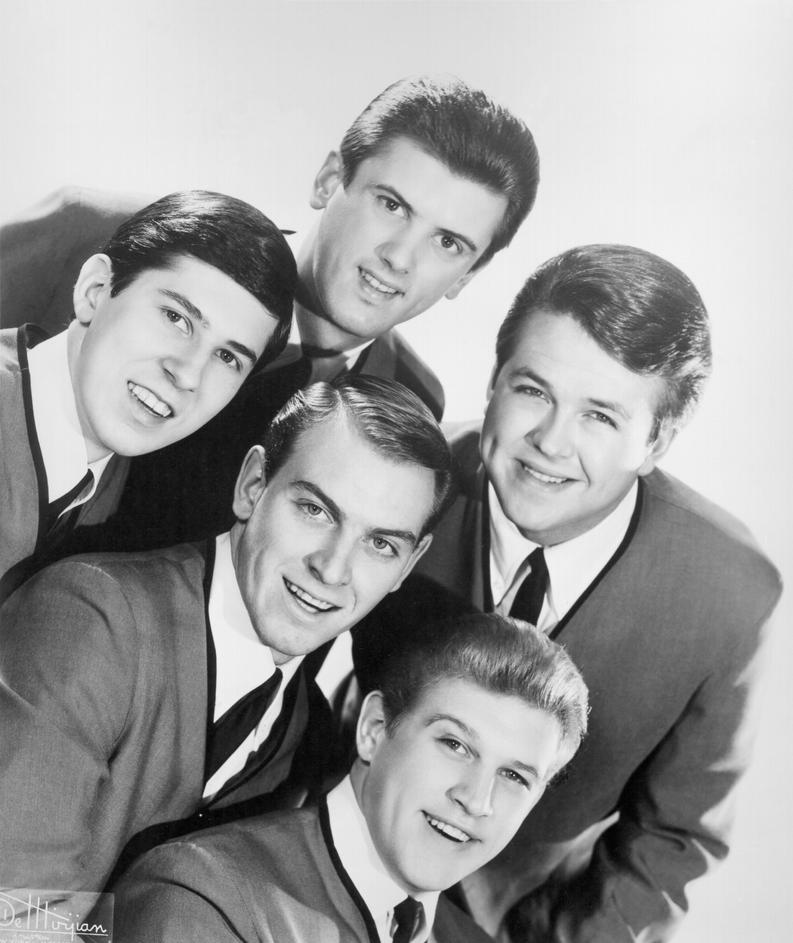 Dick Peterson, Mike Mitchell, Norm Sundholm, Lynn Easton and Barry Curtis of the rock and roll group "The Kingsmen" pose for a portrait in circa 1964.