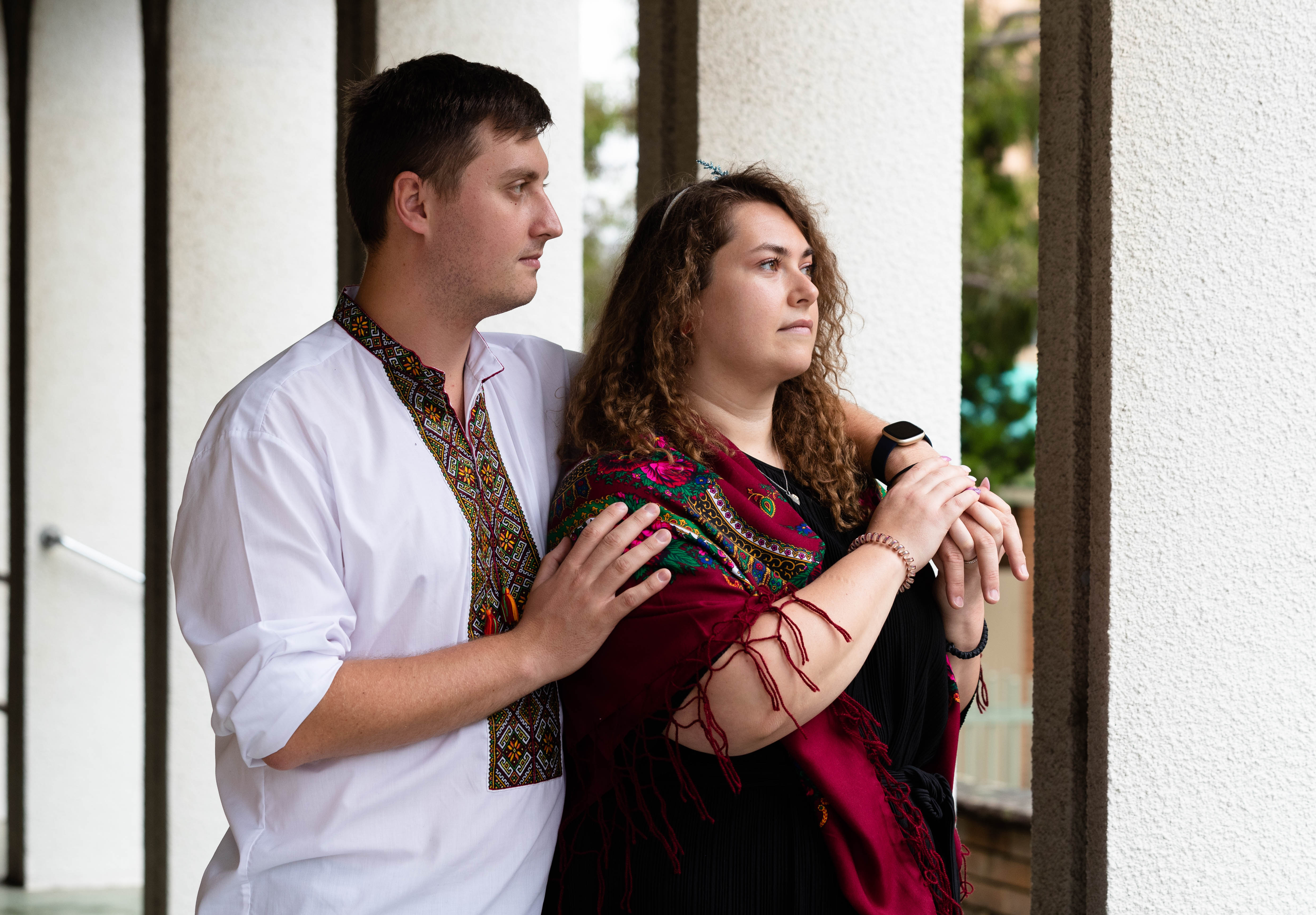 Olexa Matiouk, with his girlfriend, Anna Martyniak, at the St Andrews Ukrainian Church in Lidcombe, Sydney. He is a first generation australian but he has extended family in the Ukraine. His uncle, who is a former soldier, is now a security guard on a military installation, near Dnipro, preparing to protect the site against the Russian invasion. 