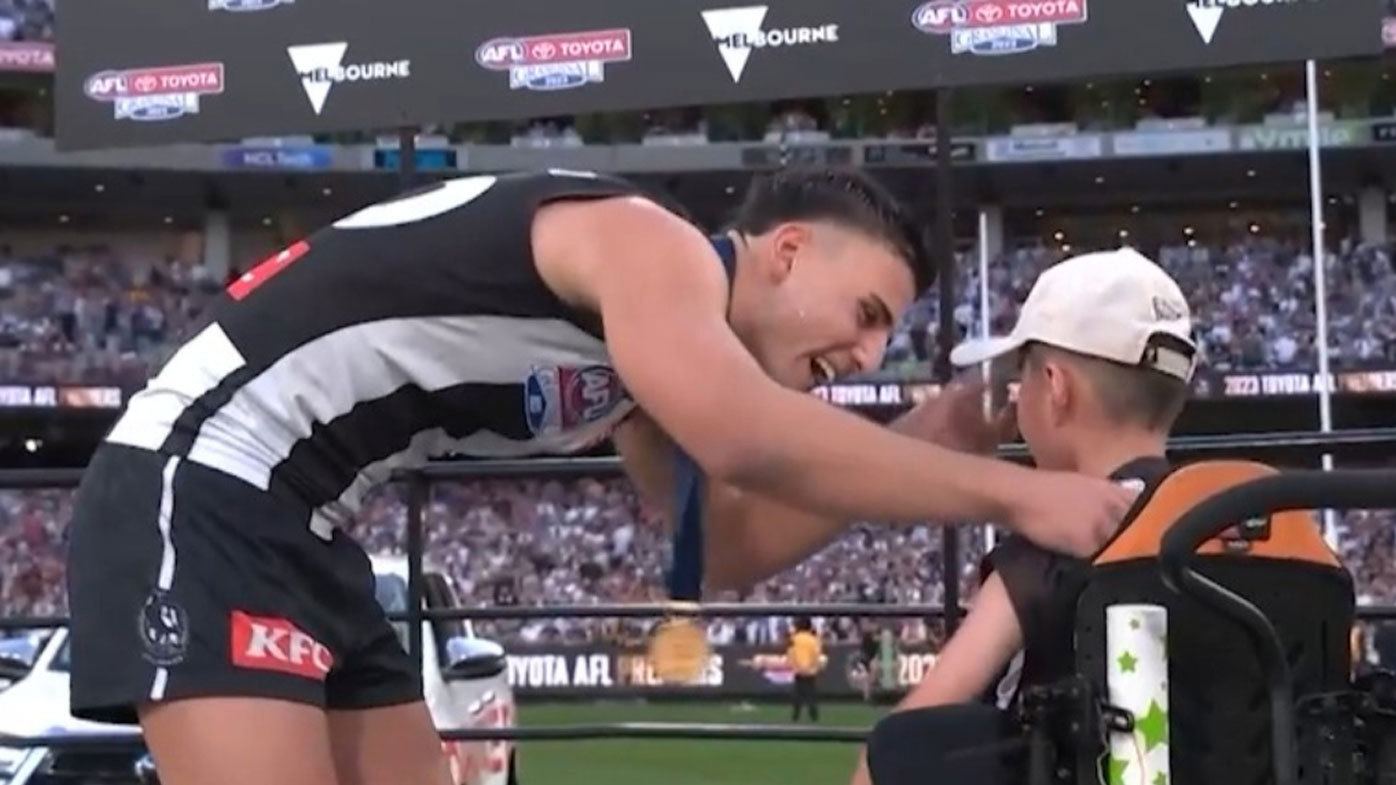 Nick Daicos had a heartwarming exchange with an Auskicker after Collingwood's premiership win