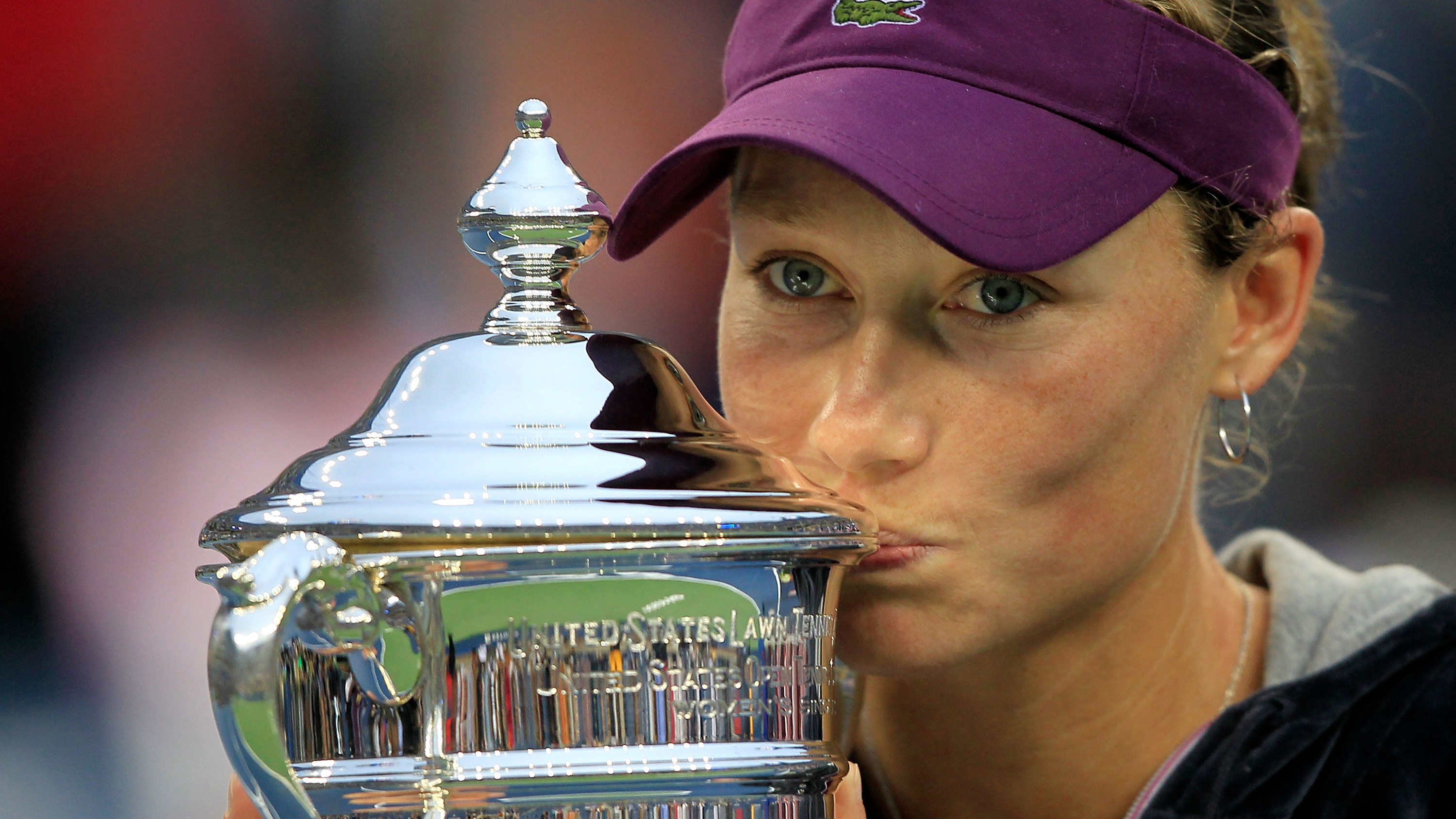 Samantha Stosur of Australia celebrates with the championship trophy after defeating Serena Williams of the United States to win the Women's Singles Final on Day Fourteen of the 2011 US Open at the USTA Billie Jean King National Tennis Center on September 11, 2011 in the Flushing neighborhood of the Queens borough of New York City. (Photo by Chris Trotman/Getty Images)