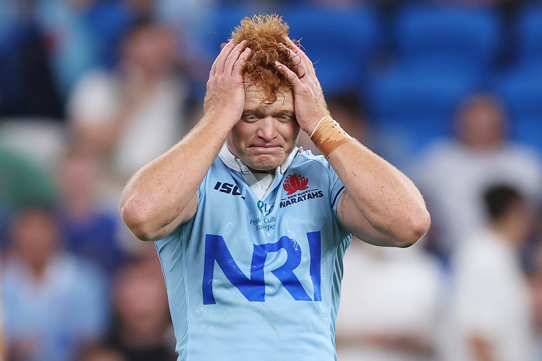 Tane Edmed of the Waratahs reacts after missing a penalty goal to win the match.