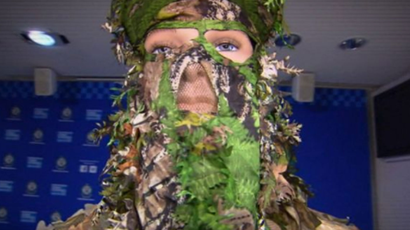 The attacker wore a camouflage suit.