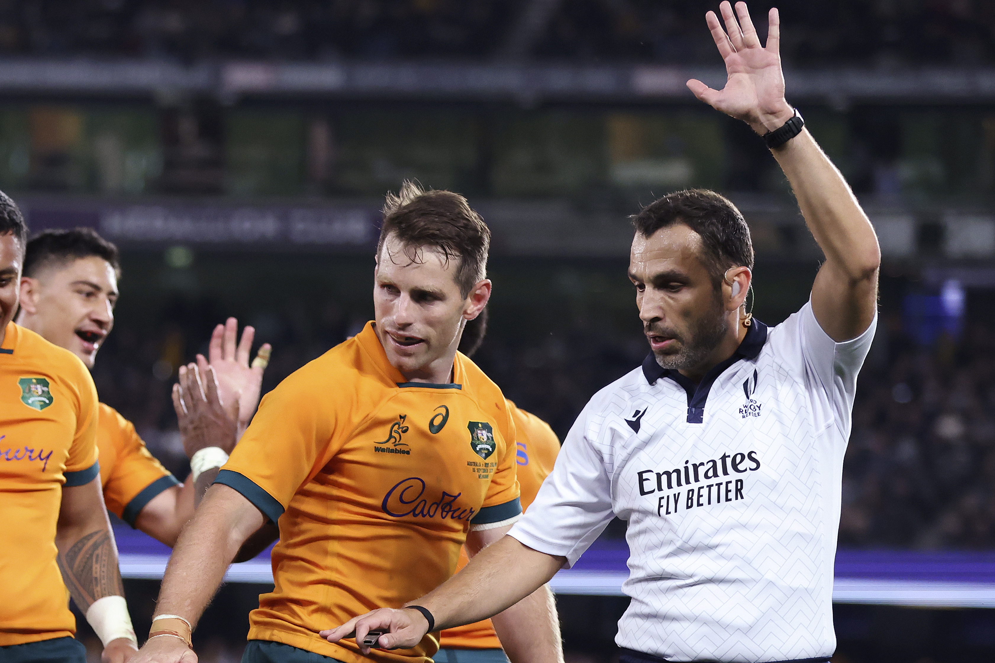 Referee Mathieu Raynal and Australia's Bernard Foley.