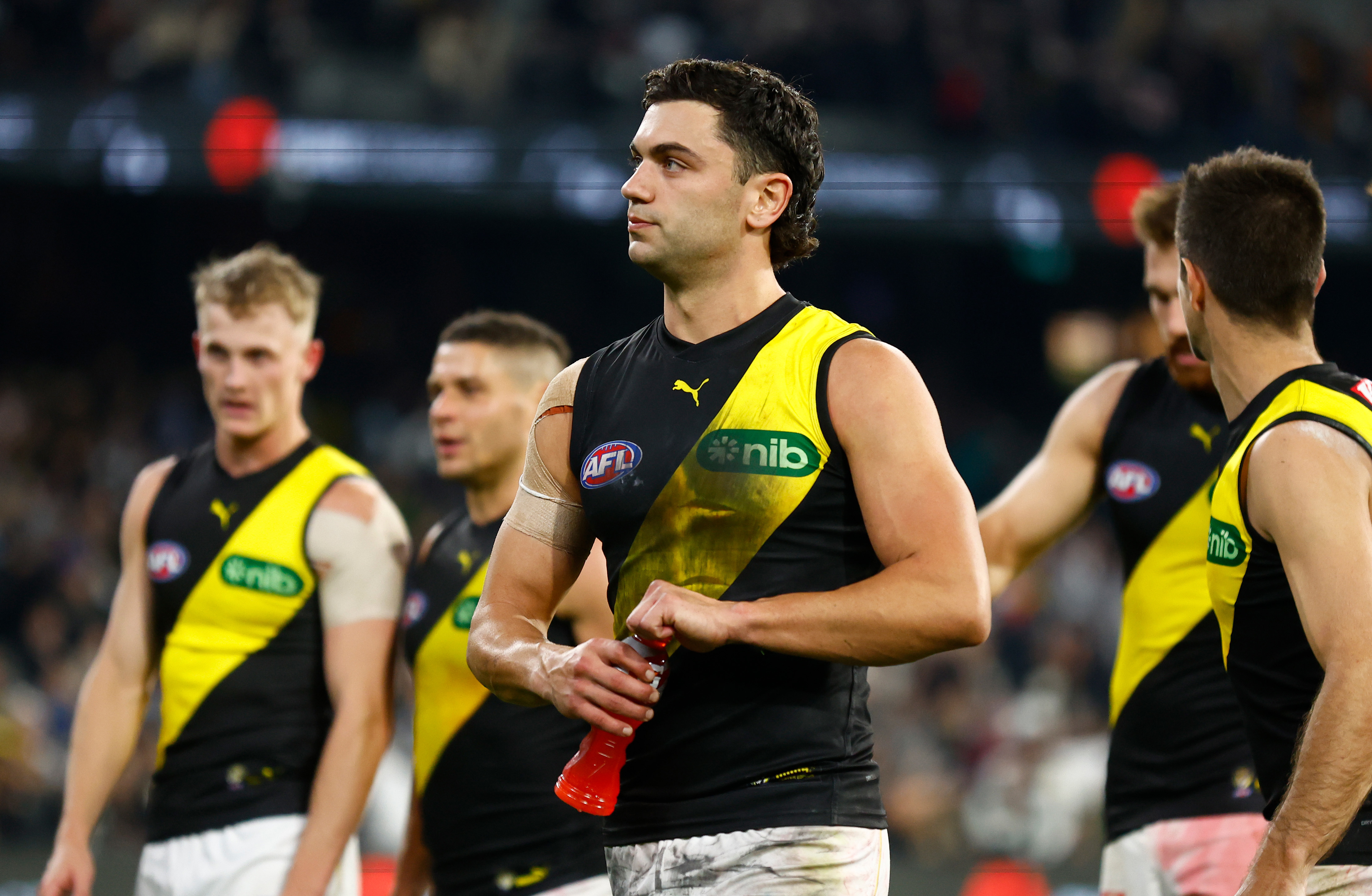 MELBOURNE, AUSTRALIA - MARCH 31: Tim Taranto of the Tigers looks dejected after a loss during the 2023 AFL Round 03 match between the Collingwood Magpies and the Richmond Tigers at the Melbourne Cricket Ground on March 31, 2023 in Melbourne, Australia. (Photo by Michael Willson/AFL Photos)