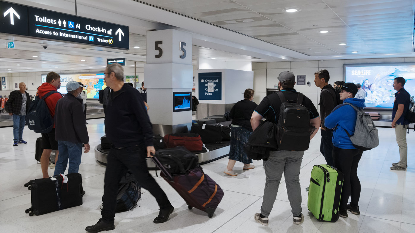 Passengers arriving from Adelaide into Sydney.