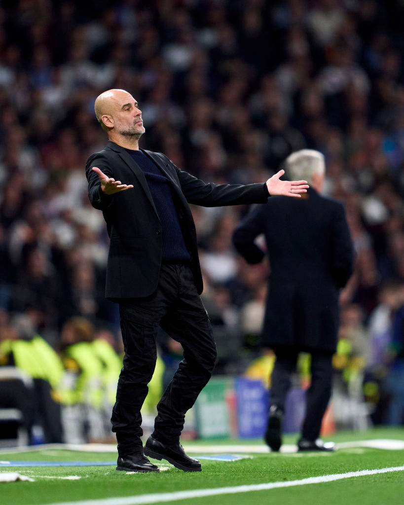 Pep Guardiola of Manchester City reacts.