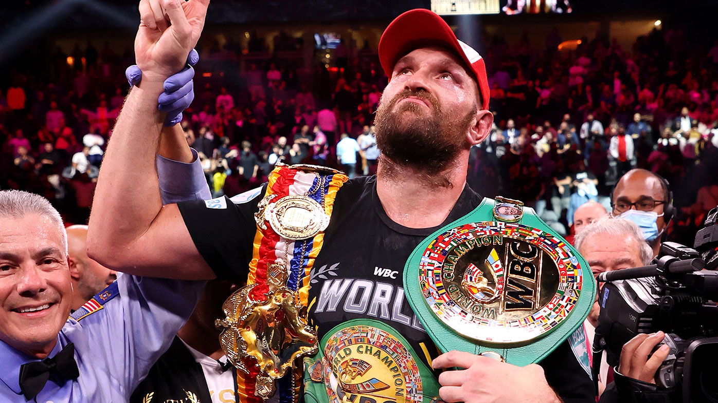 Tyson Fury celebrates his 11th round knock out win against Deontay Wilder after their WBC heavyweight title fight 