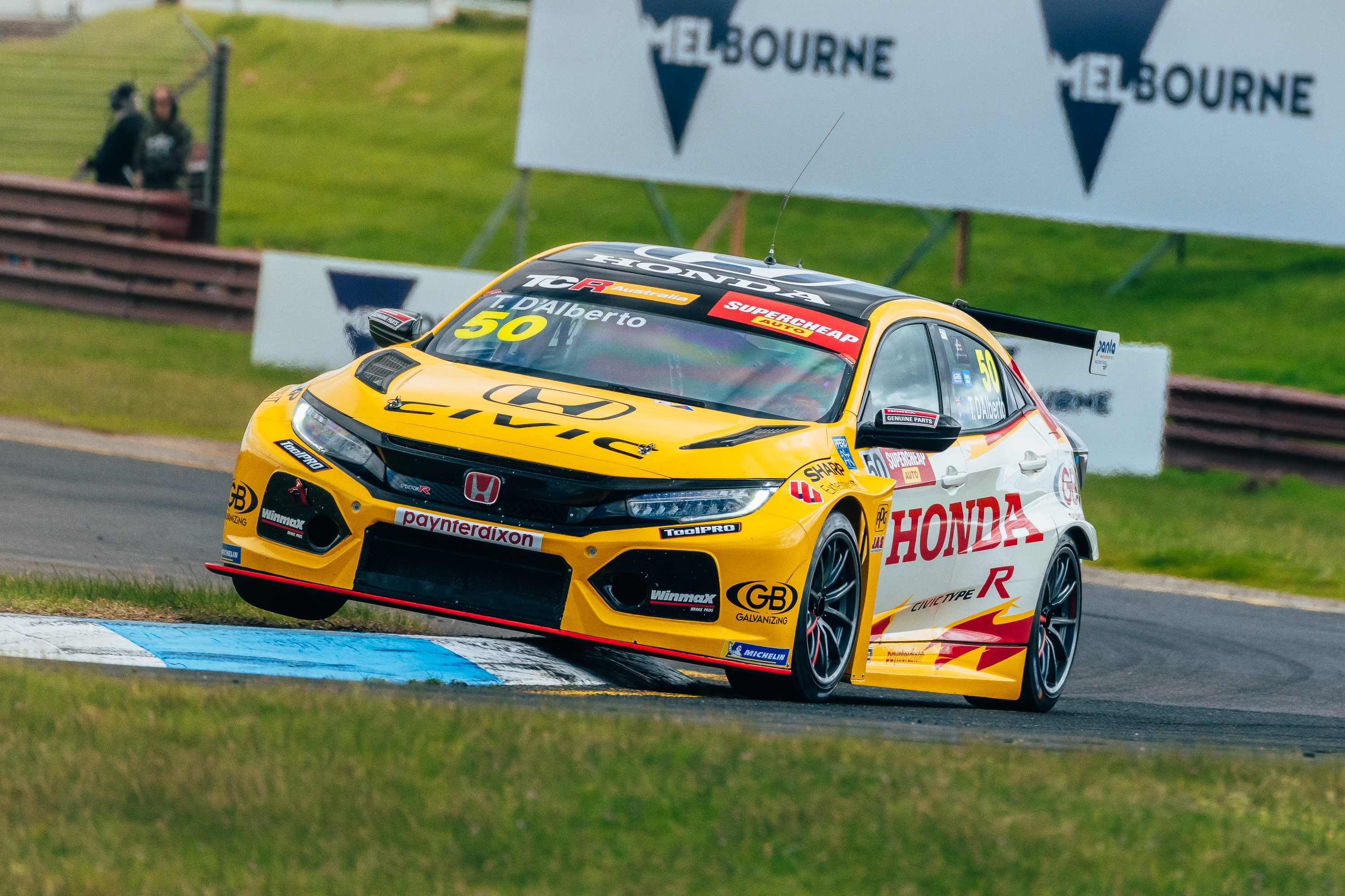 The Wall Racing Honda Civic Type R climbs the kerb at Sandown. 