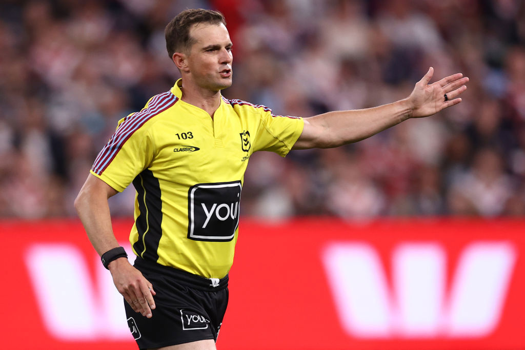 Referee Grant Atkins in action.