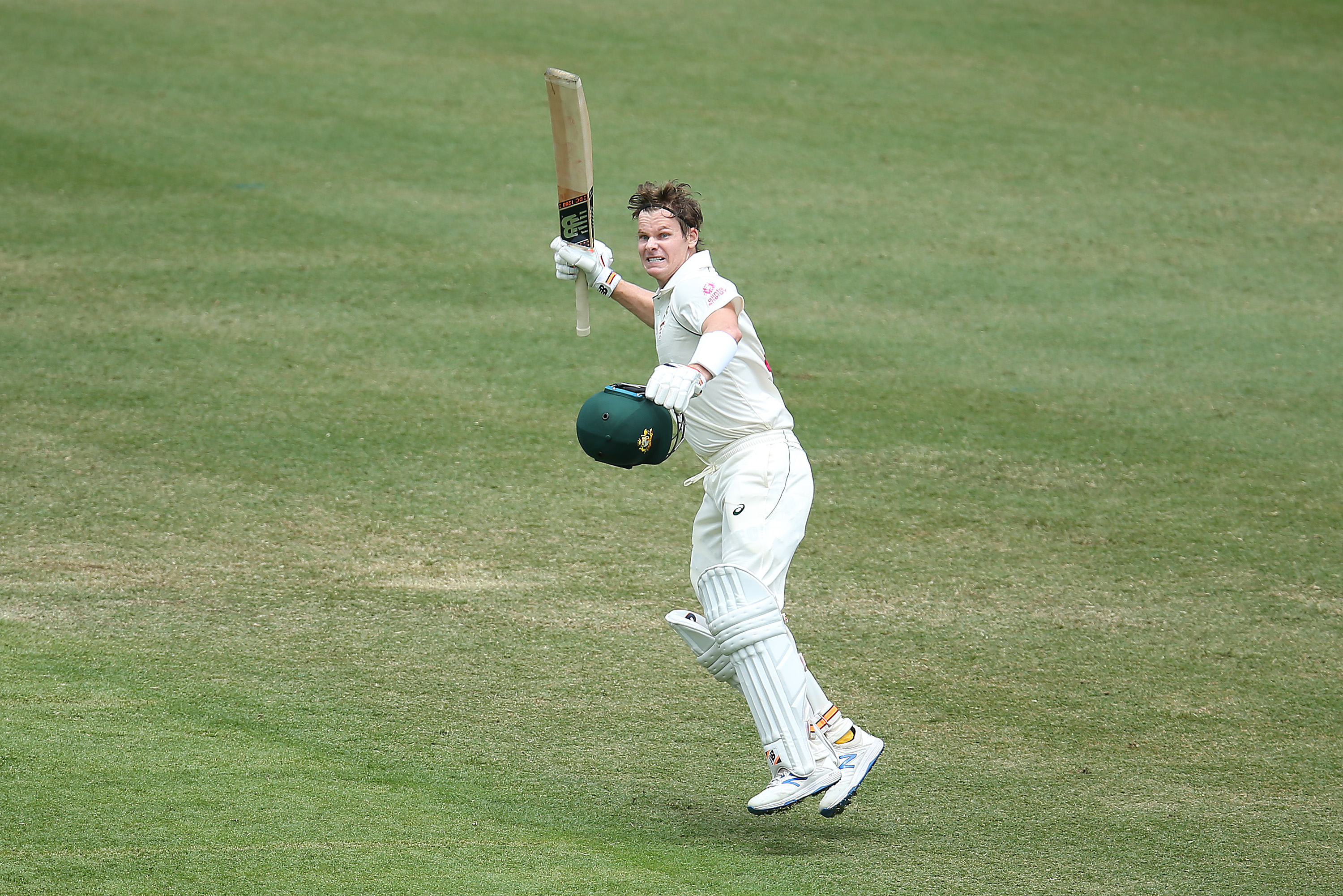 Steve Smith of Australia celebrates after reaching his century.