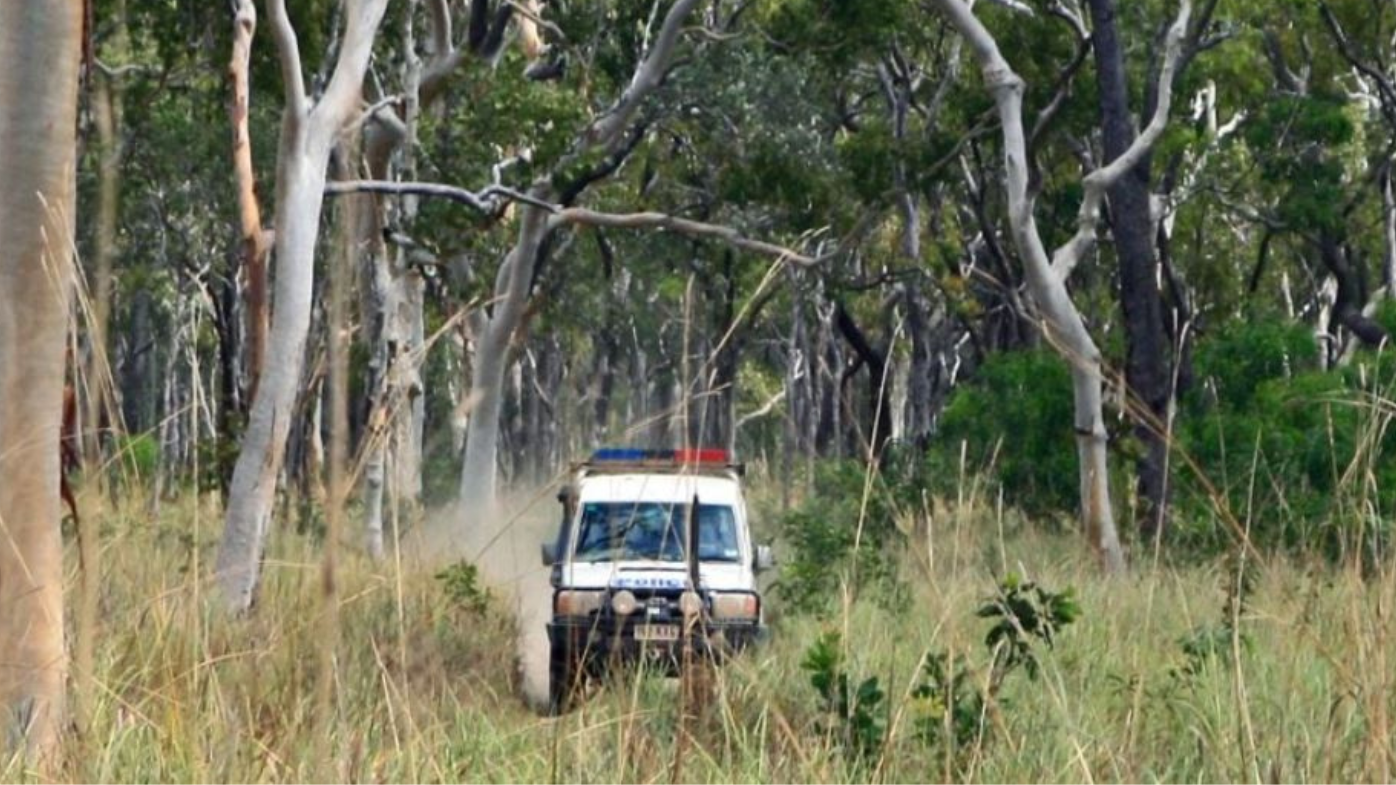 Queensland Police bush search scrublands car in grass and trees