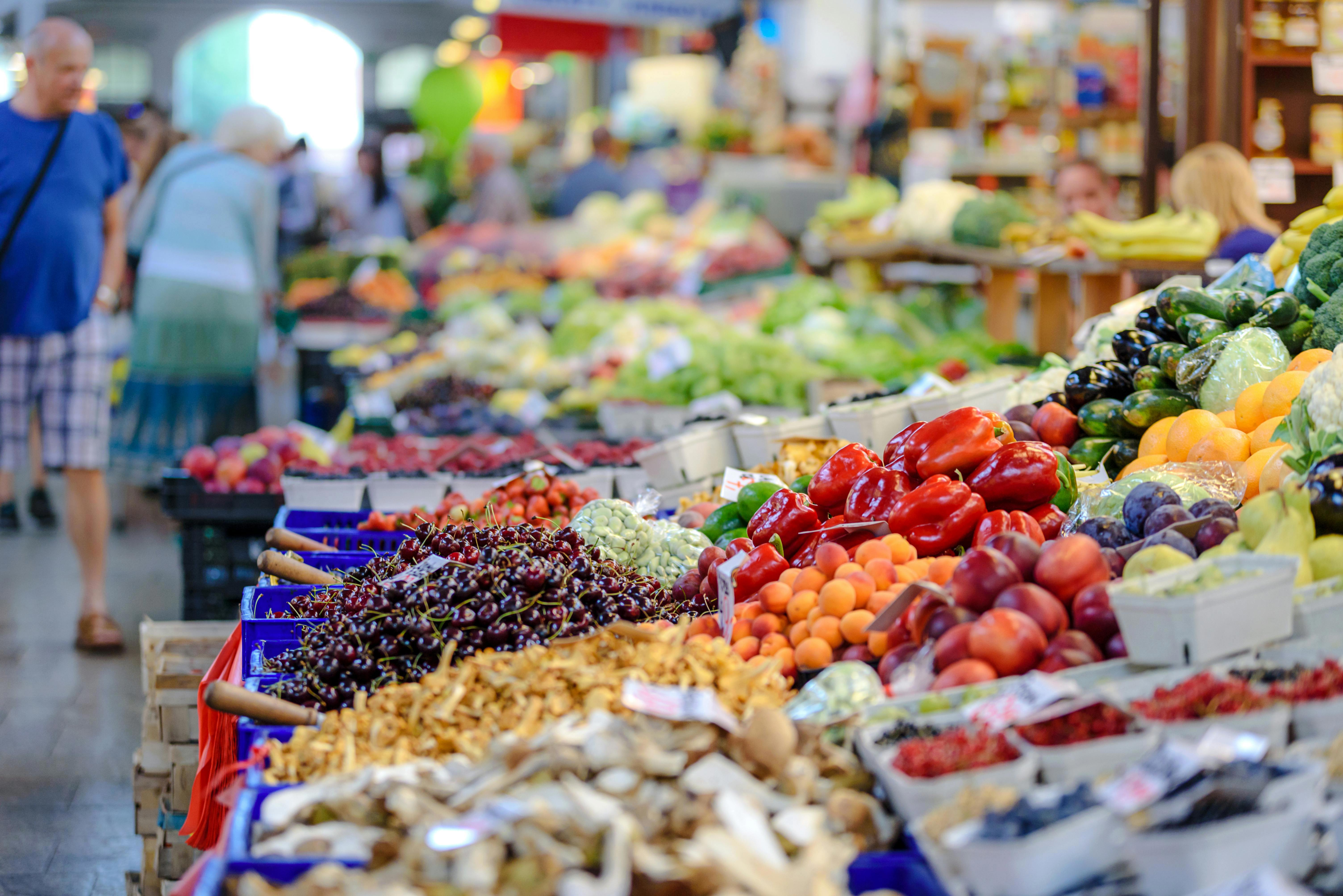 Stock image of fruit and vegetables at a grocery store or market.