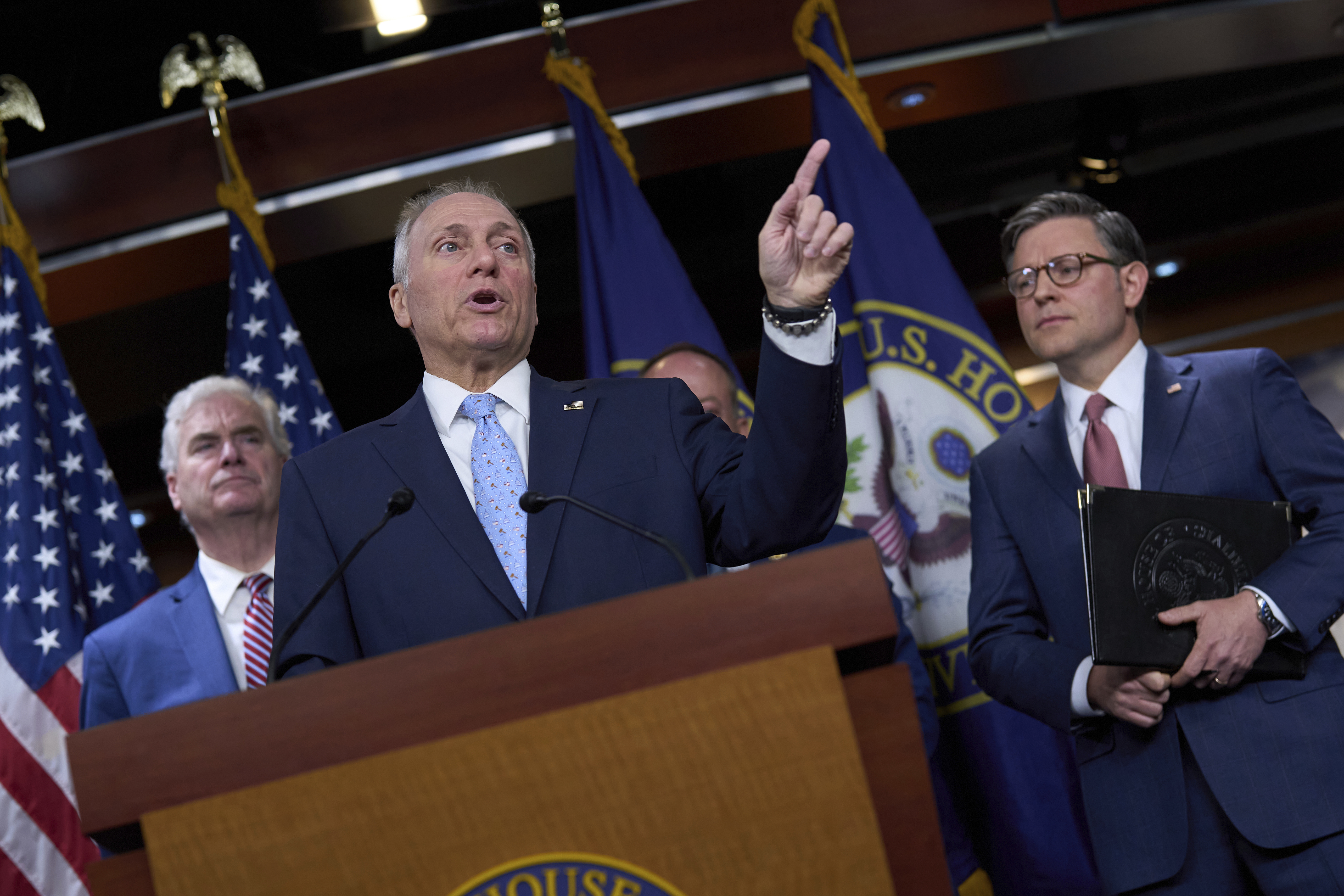 House Majority Leader Steve Scalise, R-La., makes a point as Majority Whip Tom Emmer, R-Minn., left, and Speaker of the House Mike Johnson, R-La., listen during a news conference on President Donald Trump's bill of tax breaks and spending cuts, at the Capitol in Washington, Wednesday, June 4, 2025. (AP Photo/J. Scott Applewhite)