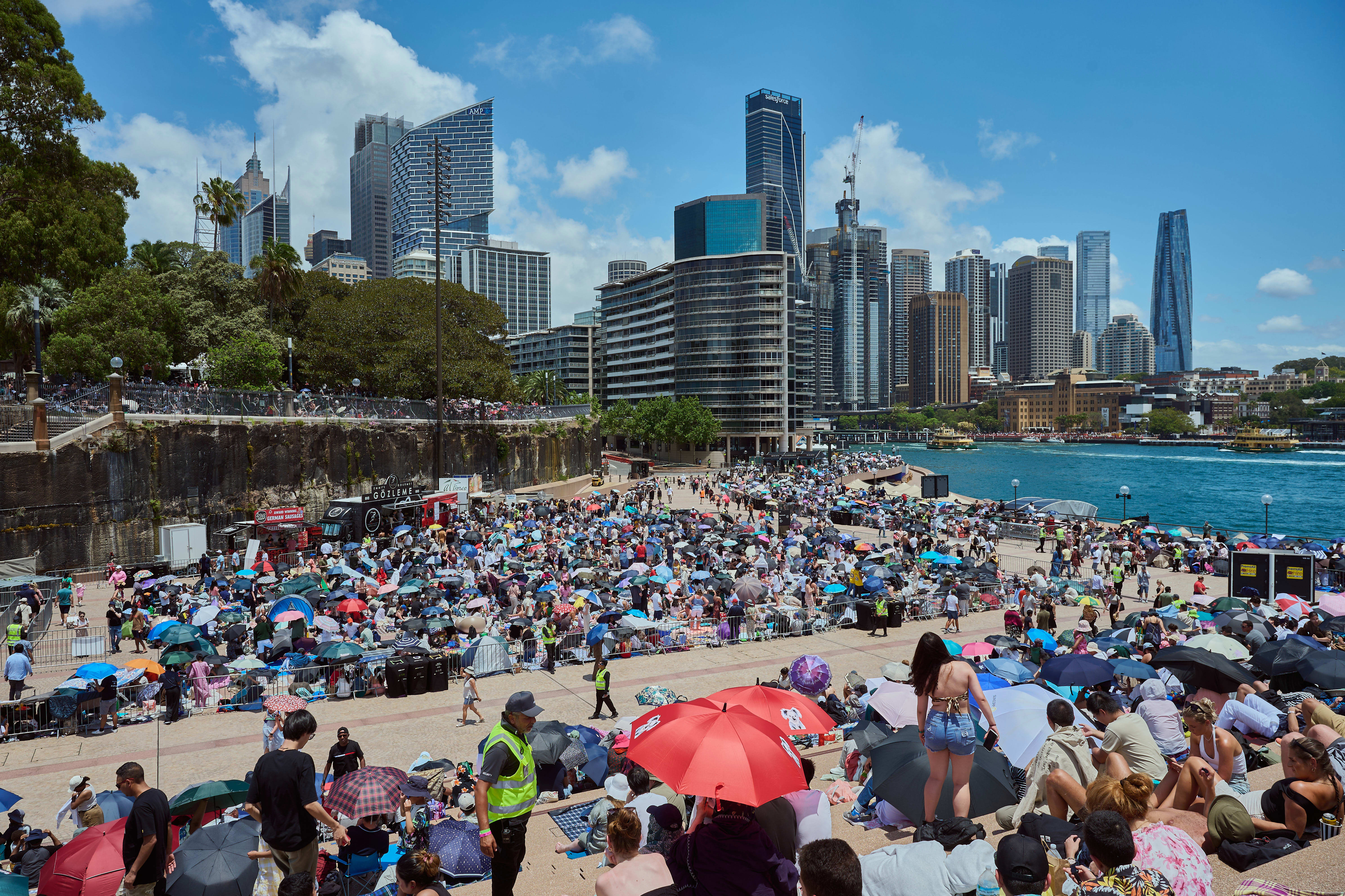 Crowd gathering at Opera House forecourt, ahead of New YearÕs Eve celebrations in Sydney on DEC 31, 2024. Photo: Flavio Brancaleone / The Sydney Morning Herald
