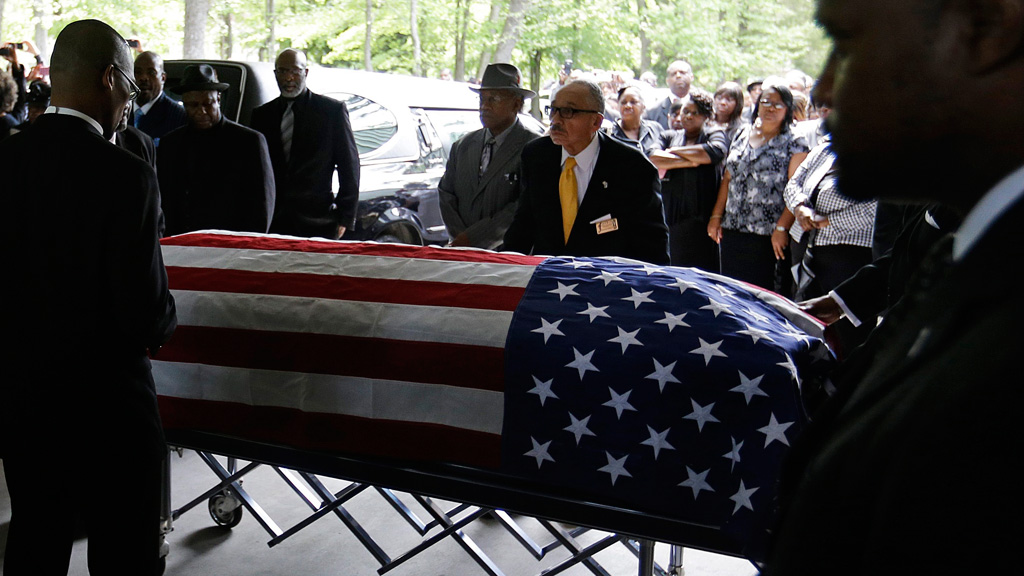 The casket of Walter Scott is taken into the W.O.R.D. Ministries Christian Center in Summerville, South Carolina, for his funeral. (AAP)