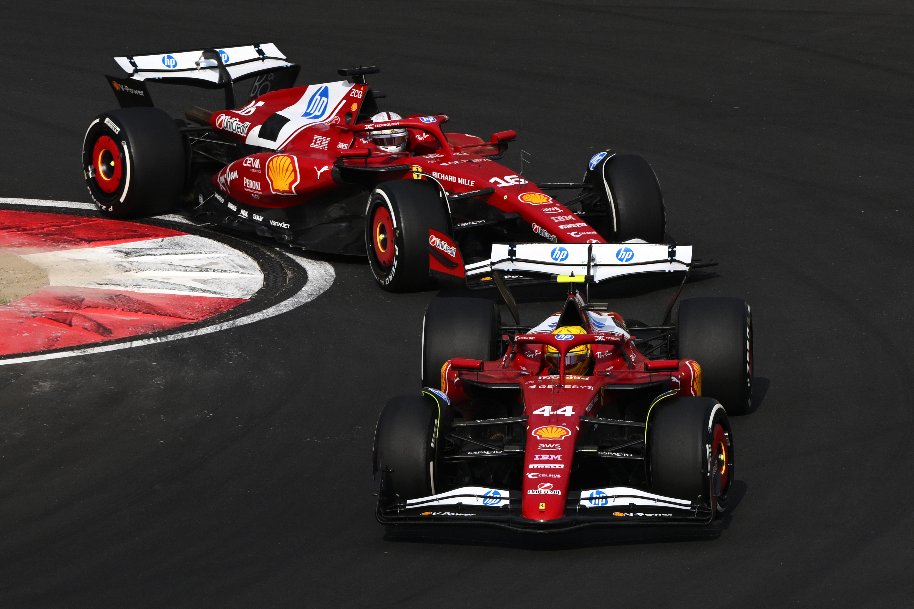 Lewis Hamilton of Great Britain driving the (44) Scuderia Ferrari SF-25 leads Charles Leclerc of Monaco driving the (16) Scuderia Ferrari SF-25 on track during the F1 Grand Prix of China at Shanghai International Circuit on March 23, 2025 in Shanghai, China. (Photo by Clive Mason/Getty Images)