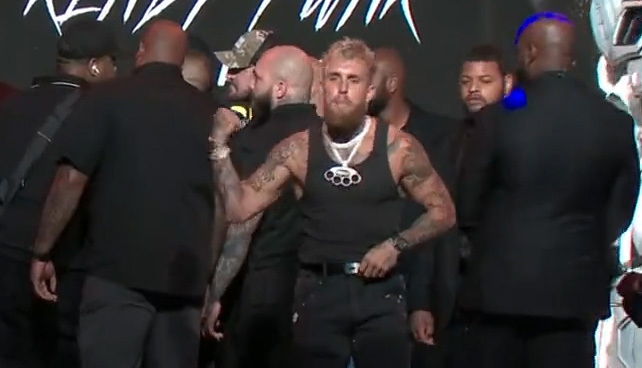 Chaos erupted behind Jake Paul during his face off with Nate Diaz.