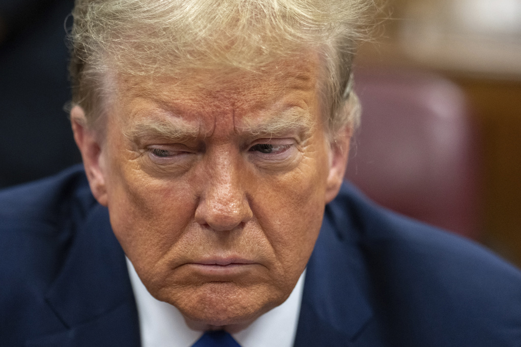 Former US President Donald Trump awaits the start of proceedings during jury selection at Manhattan criminal court, Thursday, April 18, 2024 in New York.