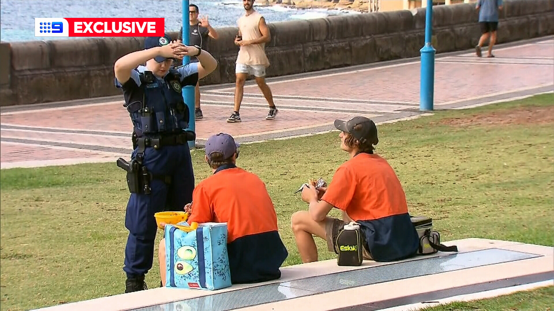 Tradies eating their lunch at Coogee are told to move on.