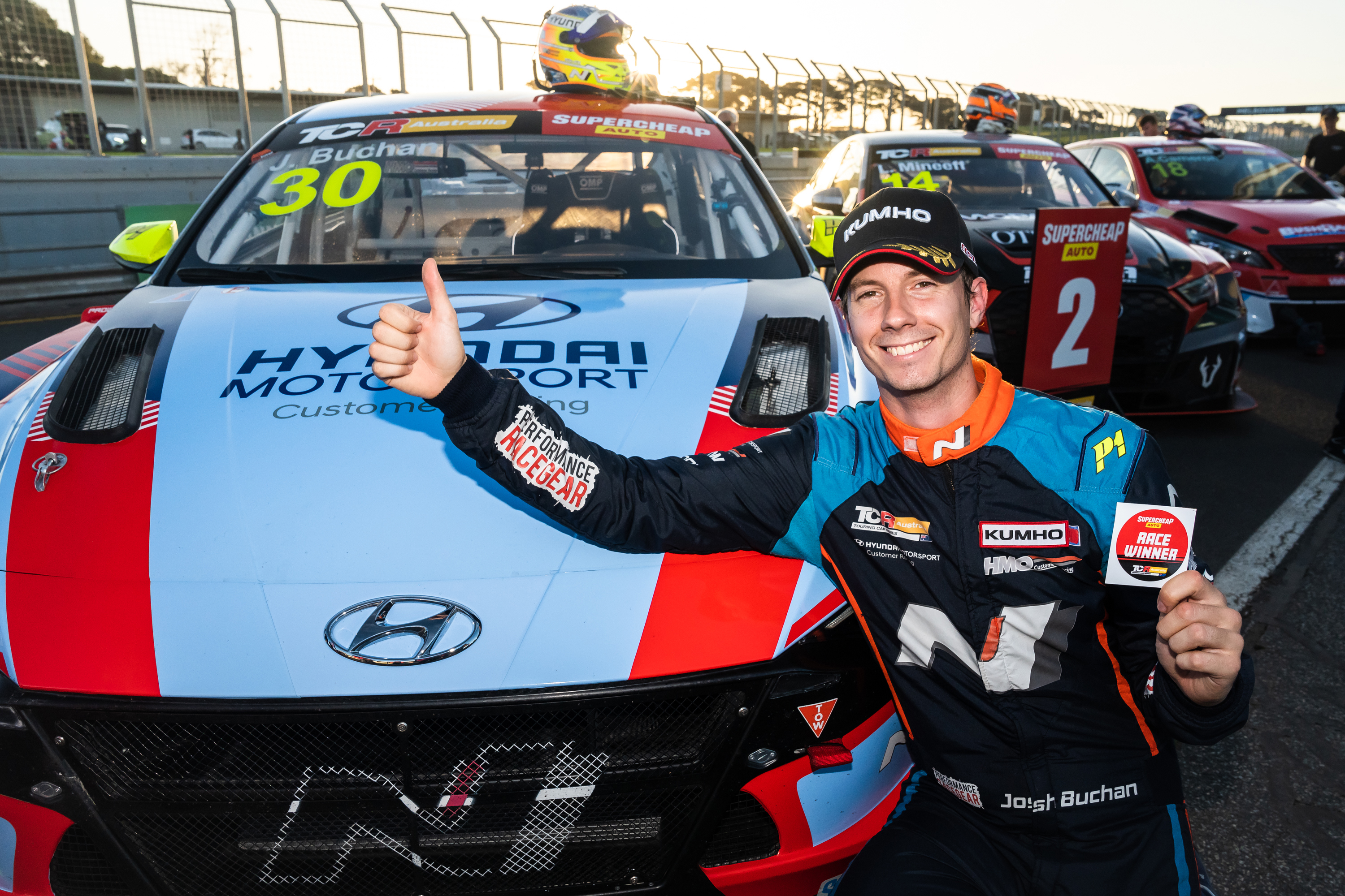 Josh Buchan celebrates his first win of the TCR Australia Series season.