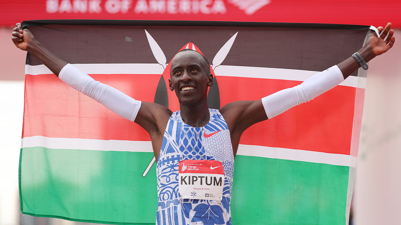 Kenya's Kelvin Kiptum celebrates winning the Chicago Marathon and breaking Eliud Kipchoge's men's marathon world record.