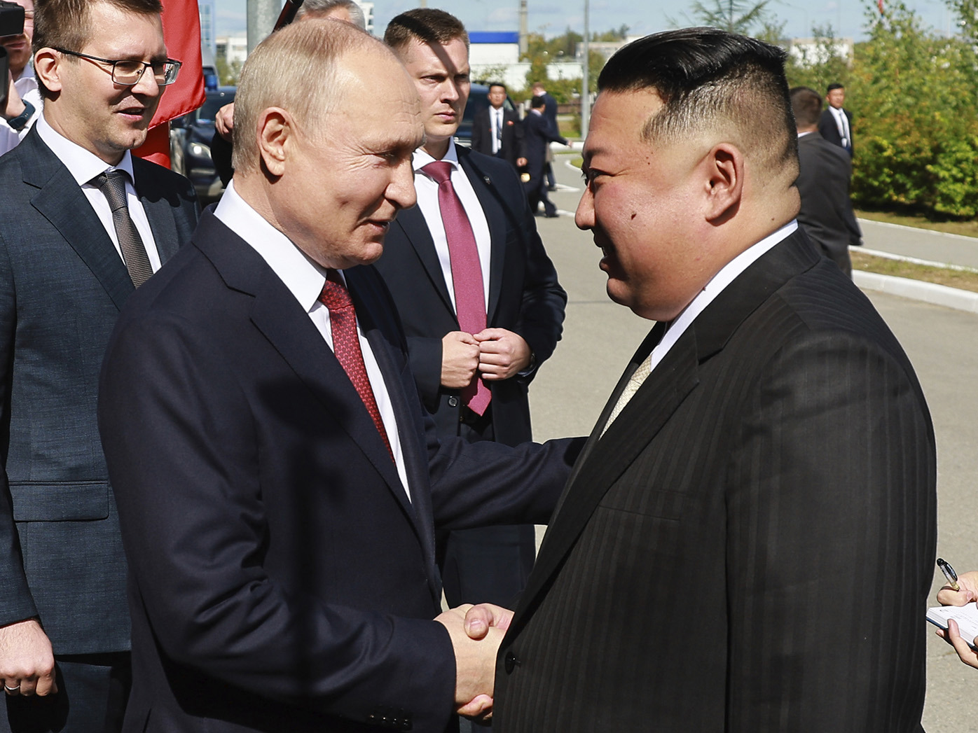 Russian President Vladimir Putin and North Korea's leader Kim Jong-un shake hands during their meeting at the Vostochny cosmodrome.