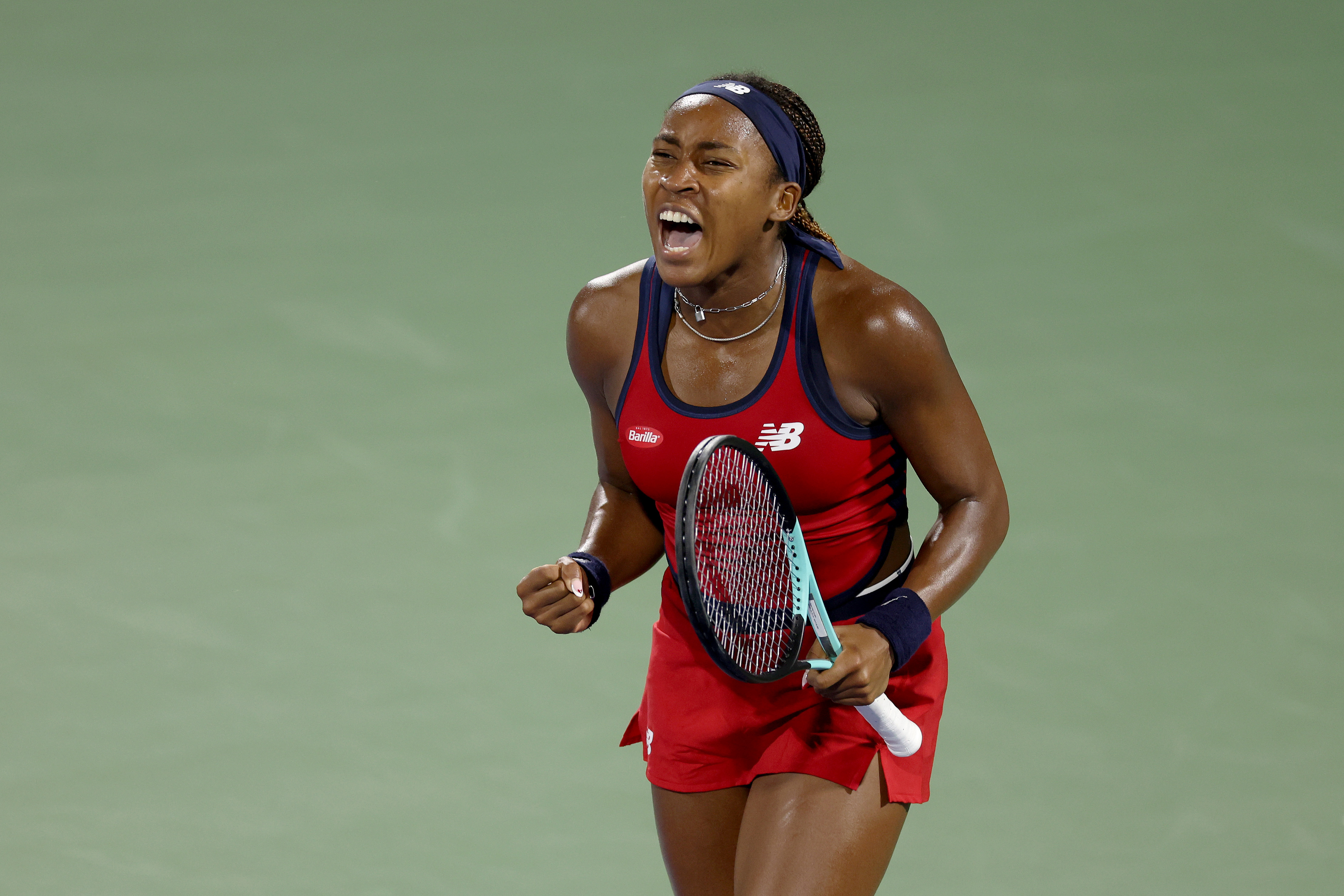 Coco Gauff celebrates victory over Karolina Pliskova in their third-round match at the Dubai Tennis Championships.