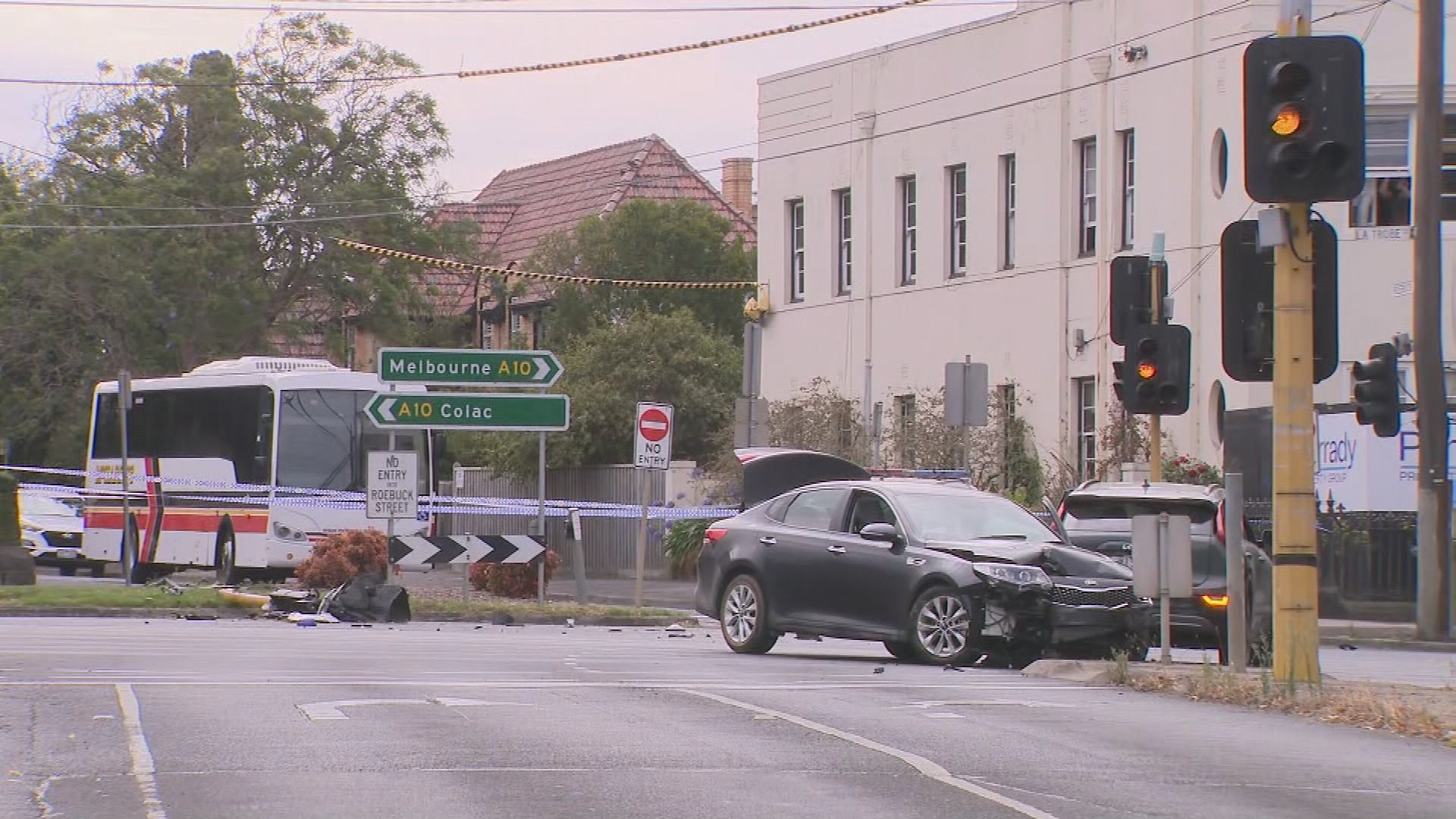 Man charged after allegedly stolen car crashes into school bus and drives at police
