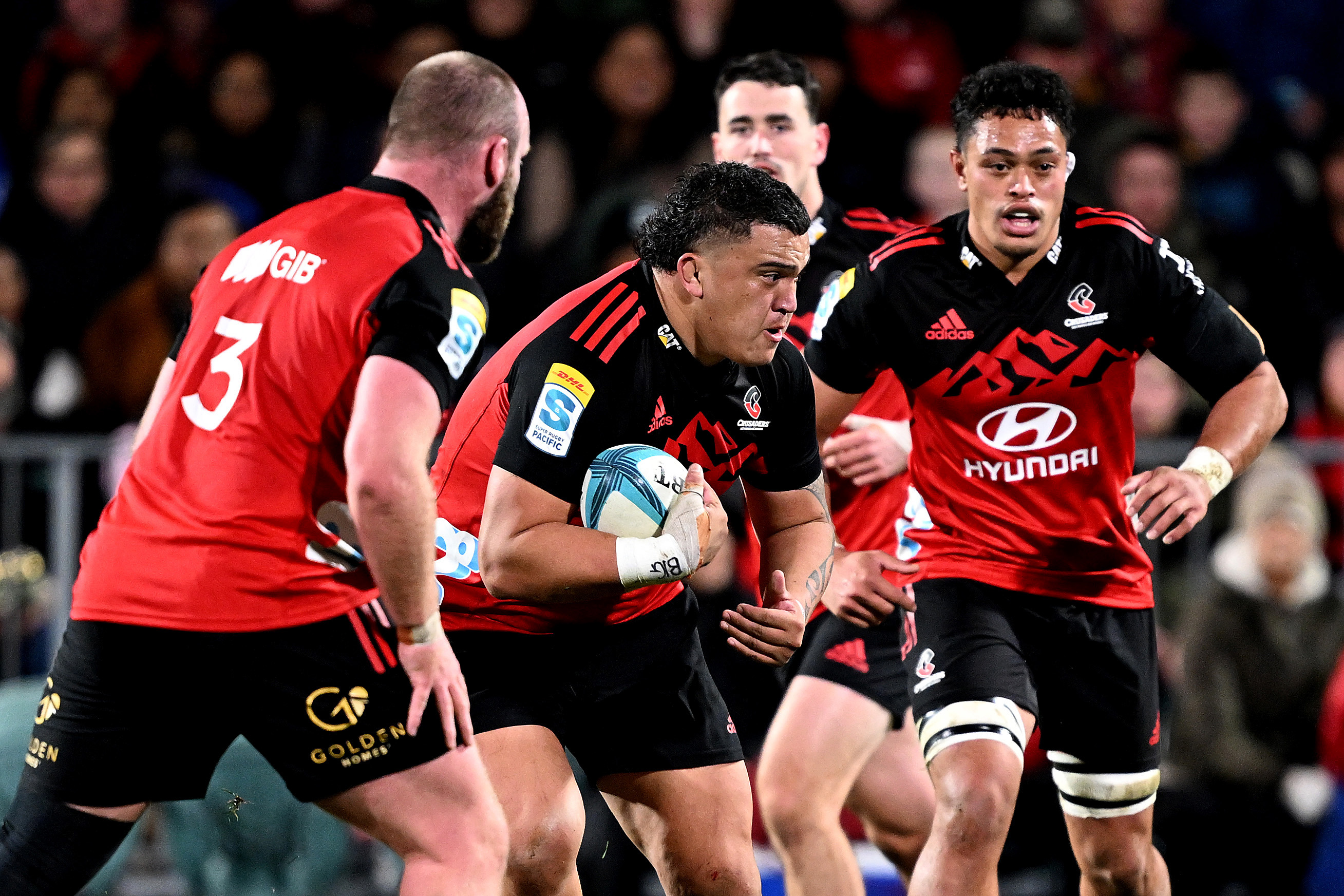 Tamaiti Williams of the Crusaders charges forward.