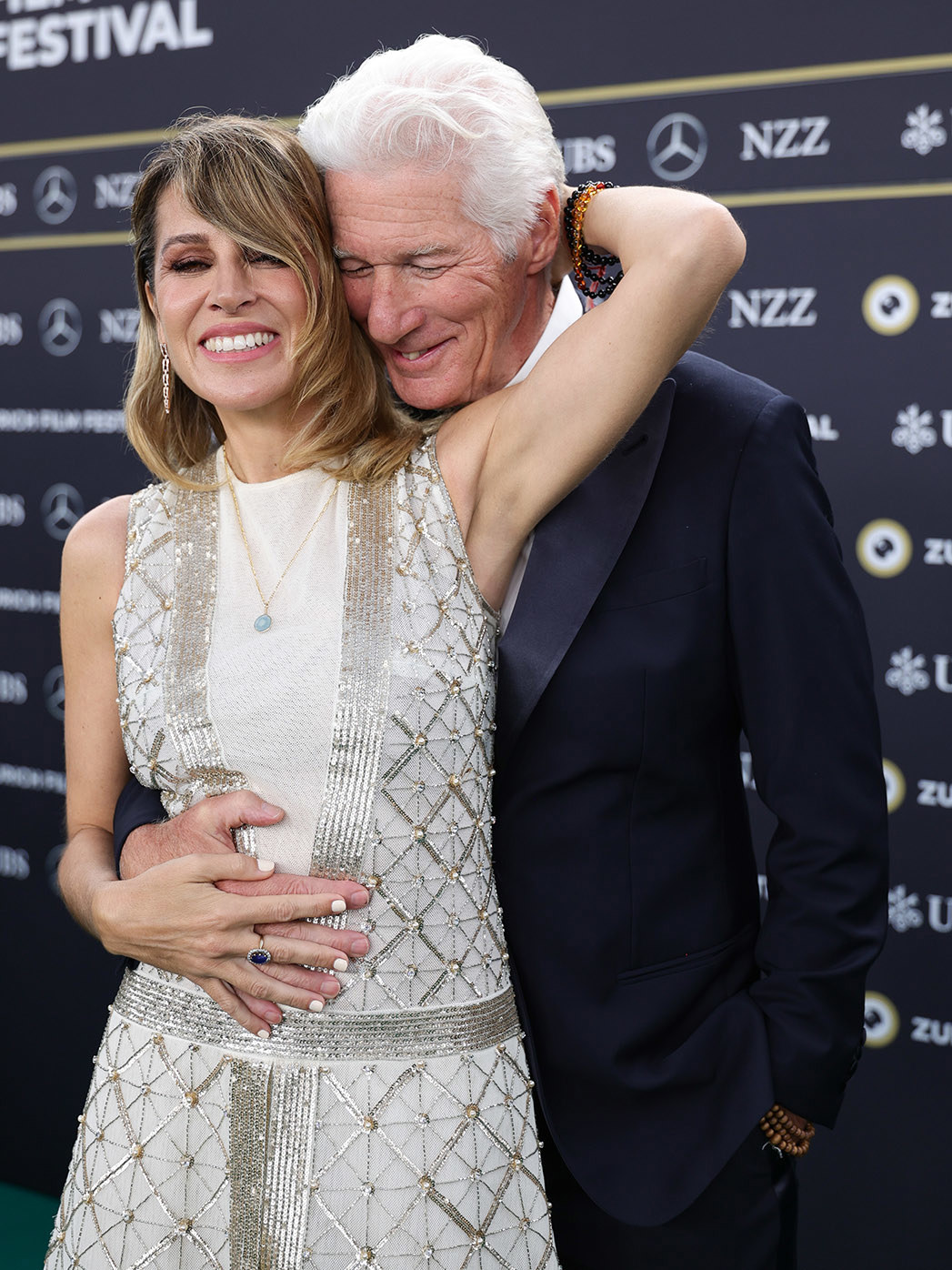 Alejandra Gere and Richard Gere attend the "Wisdom of Happiness" green carpet during the 20th Zurich Film Festival at Corso on October 08, 2024 in Zurich, Switzerland. 