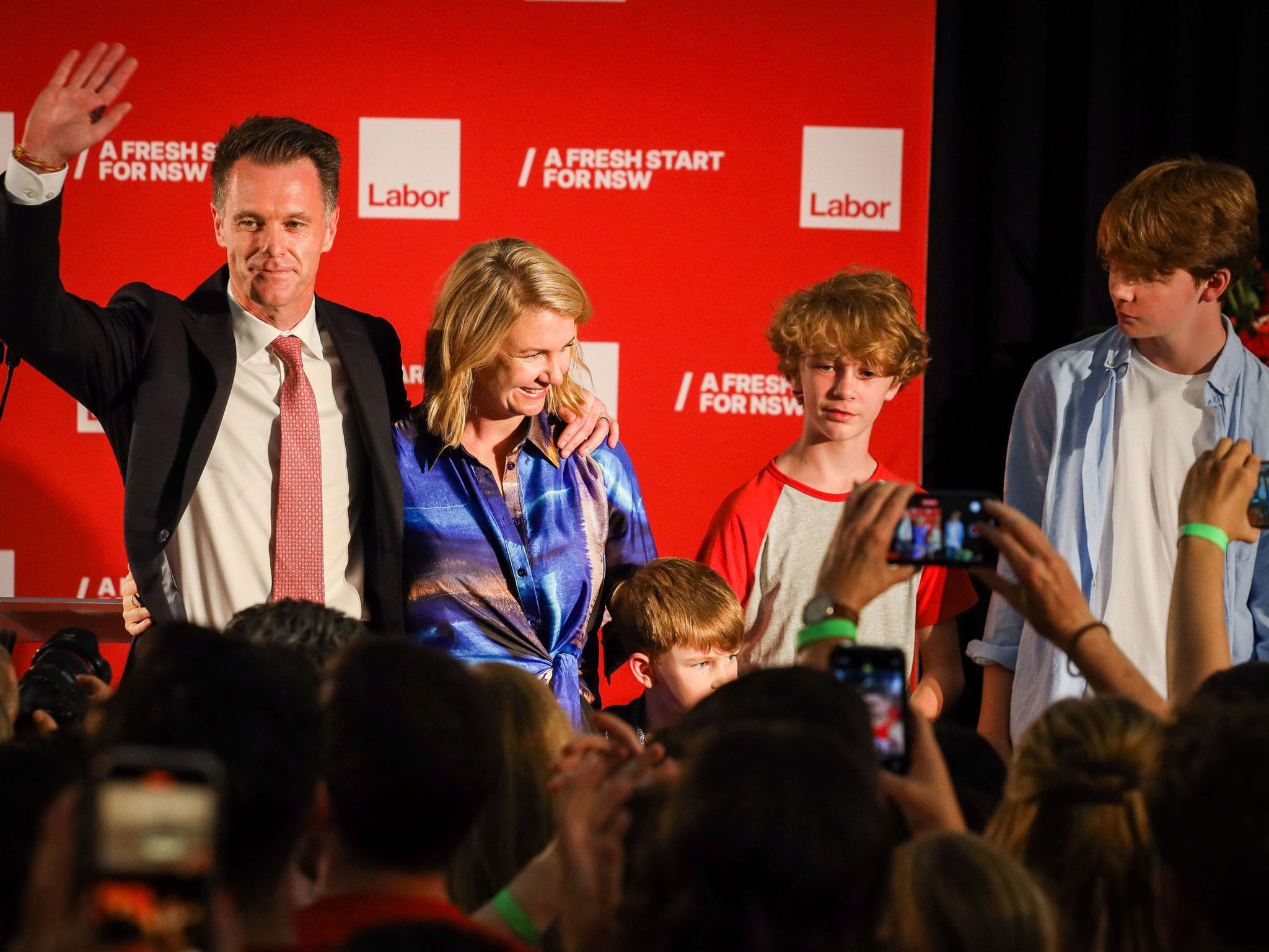 Chris Minns celebrates his election win with his family.