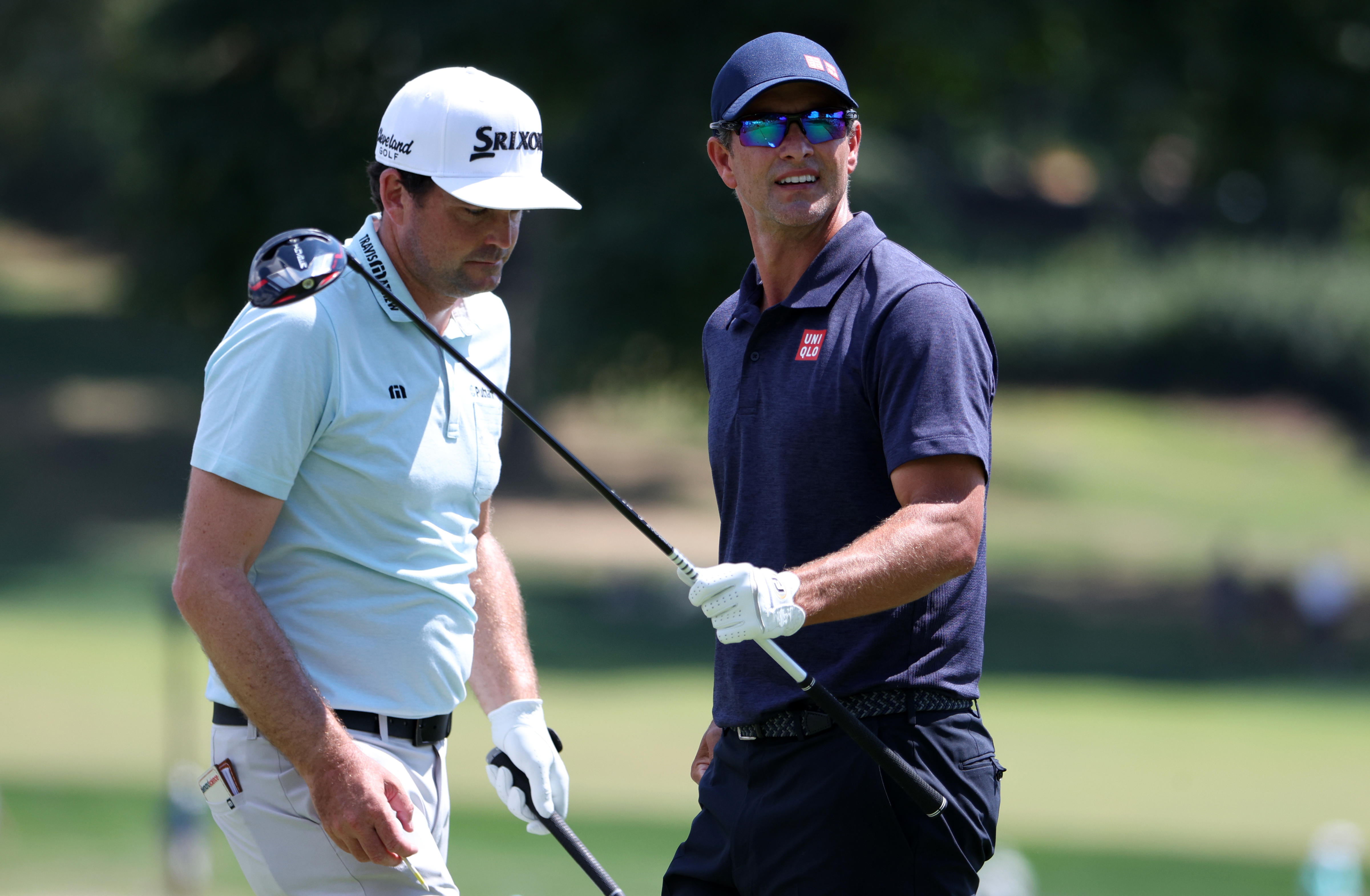 Adam Scott of Australia and Keegan Bradley of the United States walk from the third tee during the second round of the BMW Championship at Wilmington Country Club on August 19, 2022 in Wilmington, Delaware. (Photo by Rob Carr/Getty Images)