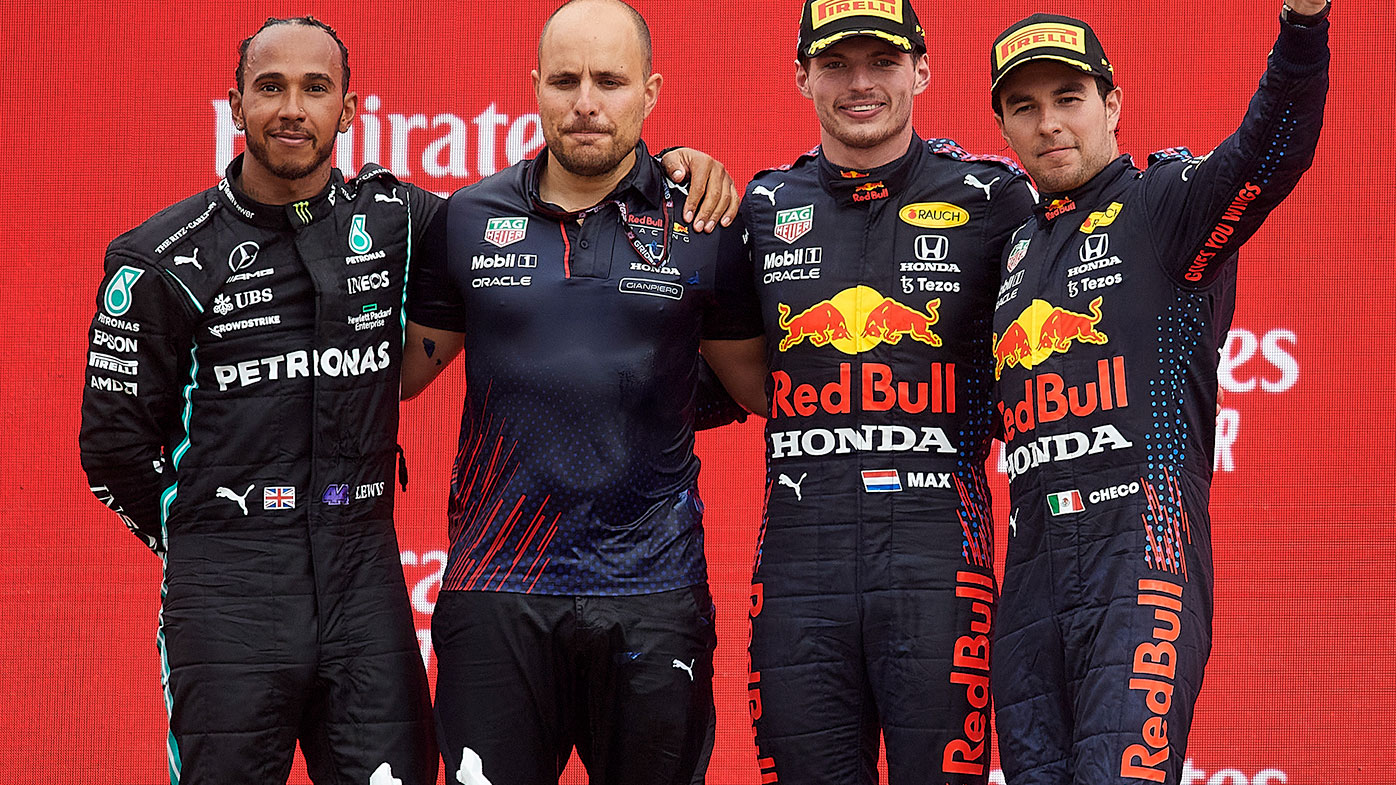 Lewis Hamilton, Max Verstappen and Sergio Perez on the podium at the French Grand Prix, along with Verstappen's race engineer Gianpiero Lambiase.
