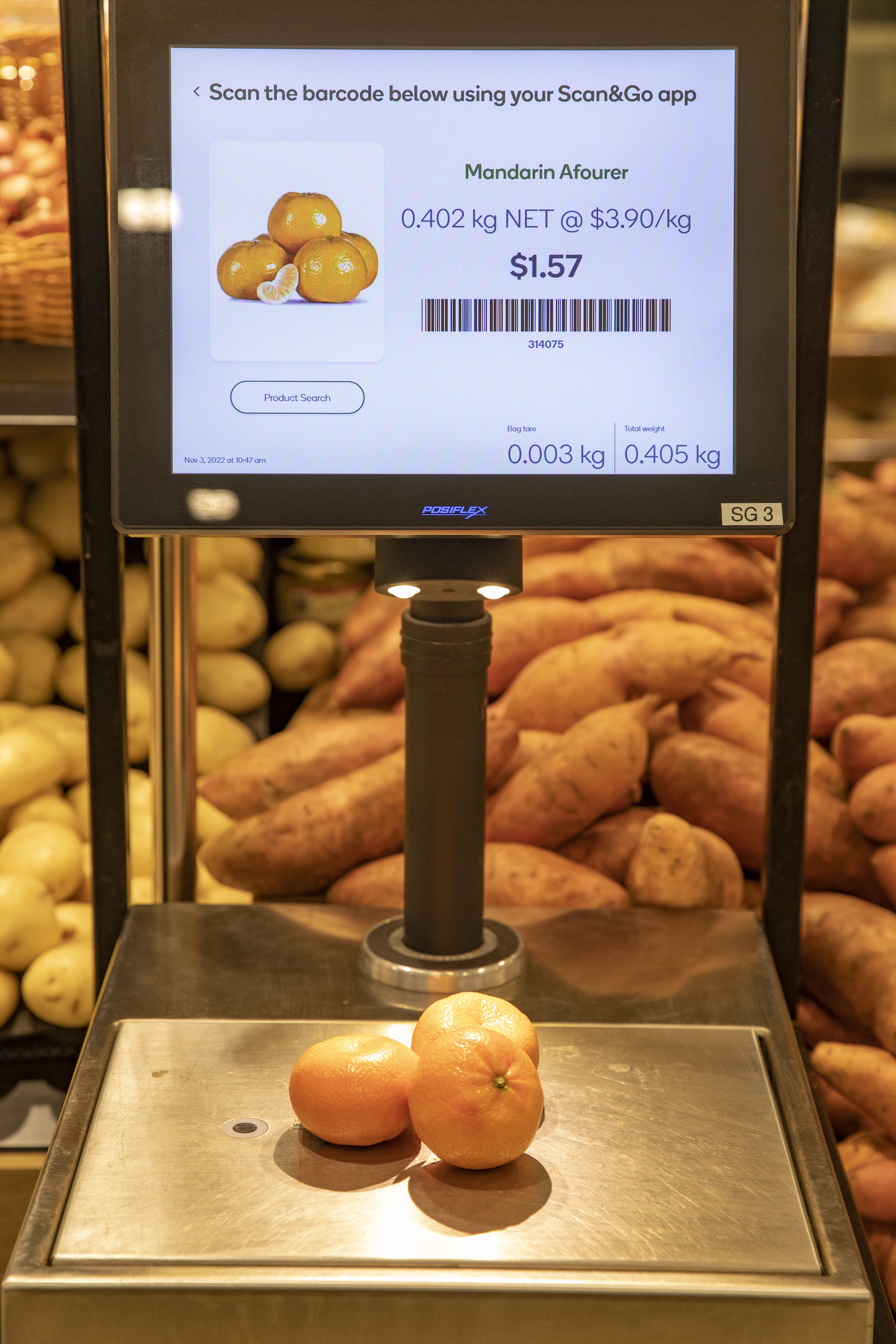 New Woolworths scales show weight and price of loose fruit and vegetables.