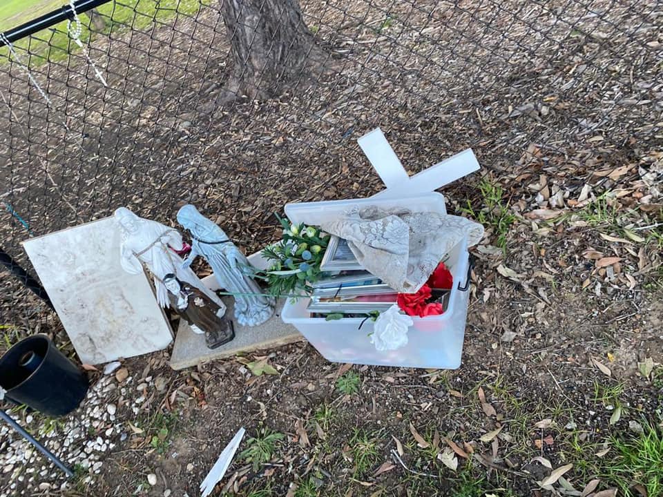 Parts of the temporary roadside memorial removed on Bettington Road, Oatlands.