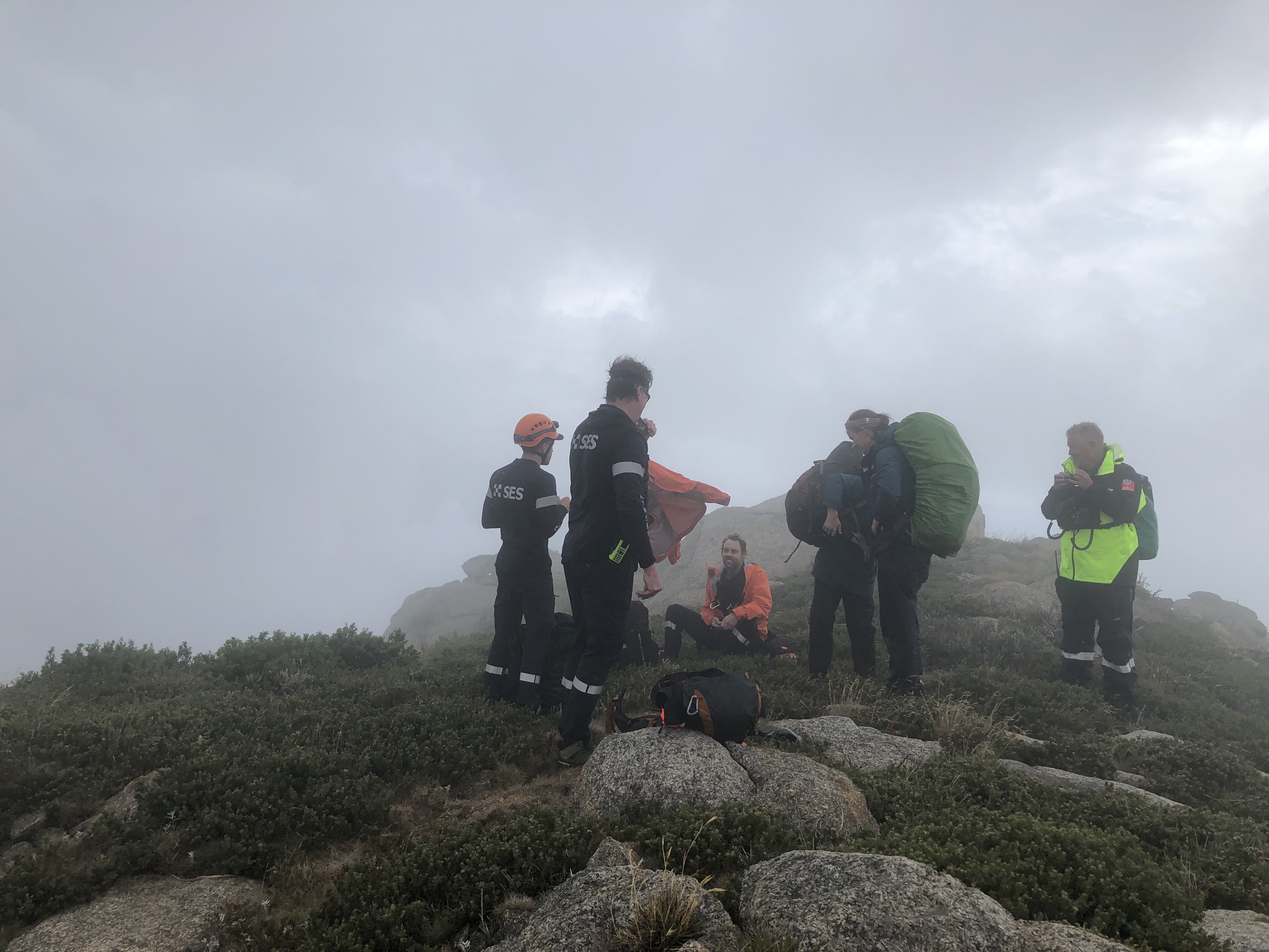 Two hikers have been rescued after becoming stuck in challenging terrain in the NSW Snowy Mountains.
