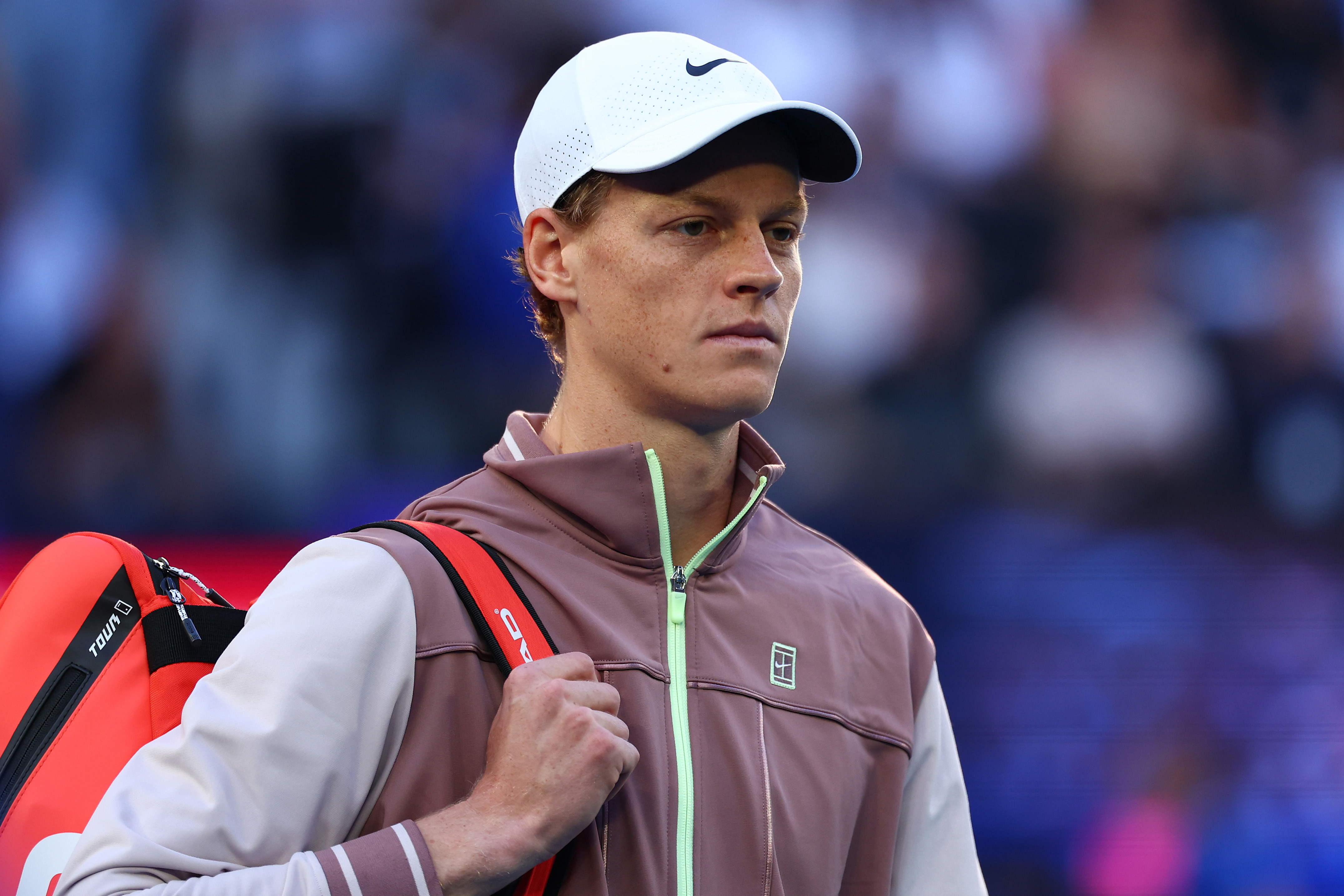 Jannik Sinner of Italy walks onto court ahead of their Men's Singles Final match against Daniil Medvedev during the 2024 Australian Open at Melbourne Park on January 28, 2024 in Melbourne, Australia. (Photo by Graham Denholm/Getty Images)