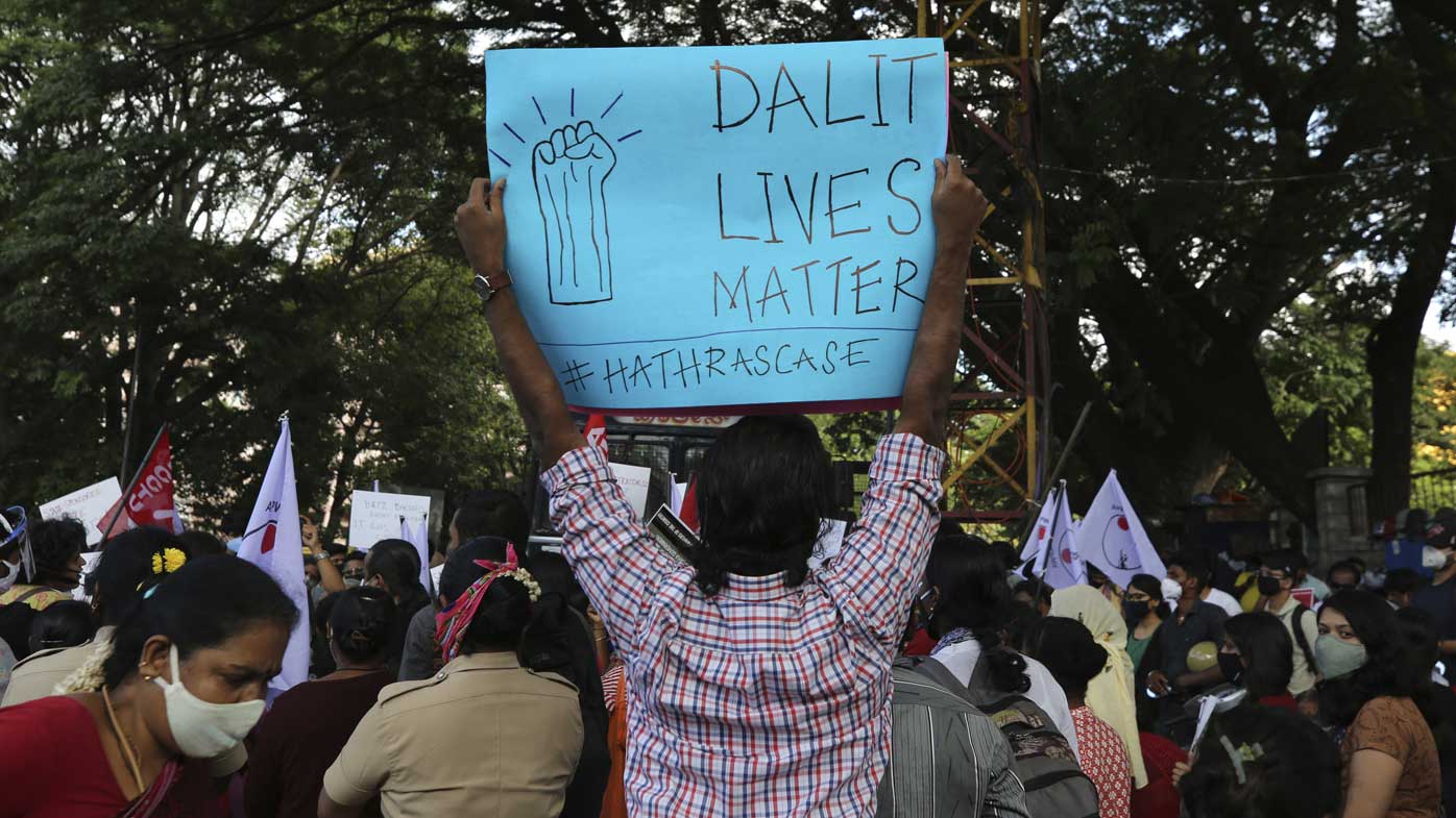 'Dalit Lives Matter' reads a sign at a protest over the death of a 19-year-old woman from the 'untouchable' caste.