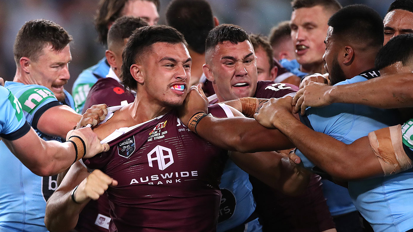 Tino Fa'asuamaleaui of the Maroons and Payne Haas of the Blues scuffle during game two of the 2020 State of Origin series