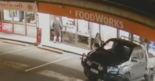 Taking place around 2:30am on Saturday morning, the lone criminal was captured on CCTV scoping out the Burleigh Waters Foodworks before the stunt. 