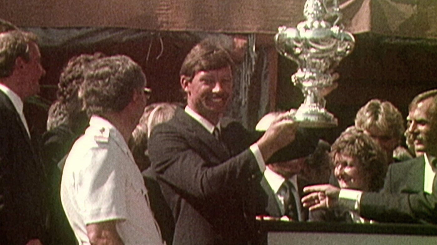John Bertrand with the America's Cup.