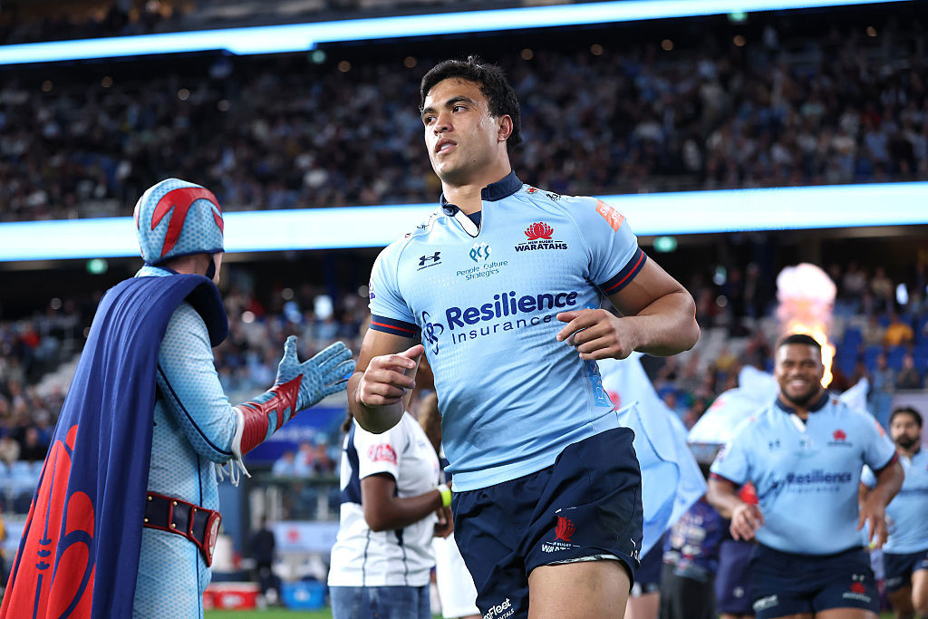 Joseph Aukuso-Suaalii of the Waratahs runs out at Allianz Stadium.