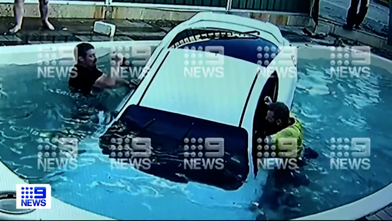 CCTV has captured the moment a young woman ploughed her car through the fence of a Perth home and landed in the swimming pool. 