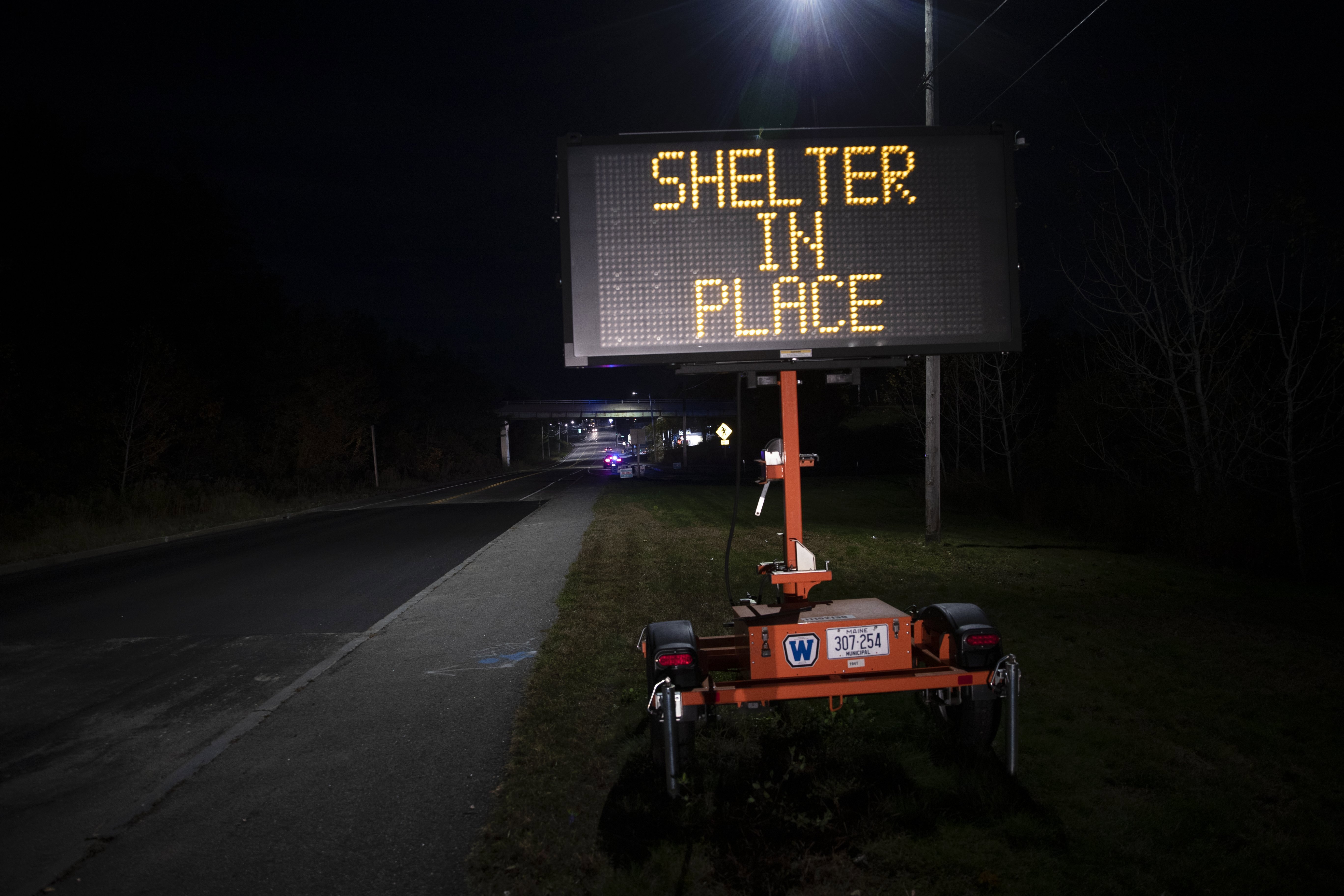 A sign signals the public to shelter in place during an active shooter situation on Wednesday, Oct. 25, 2023, in Lewiston, Maine 