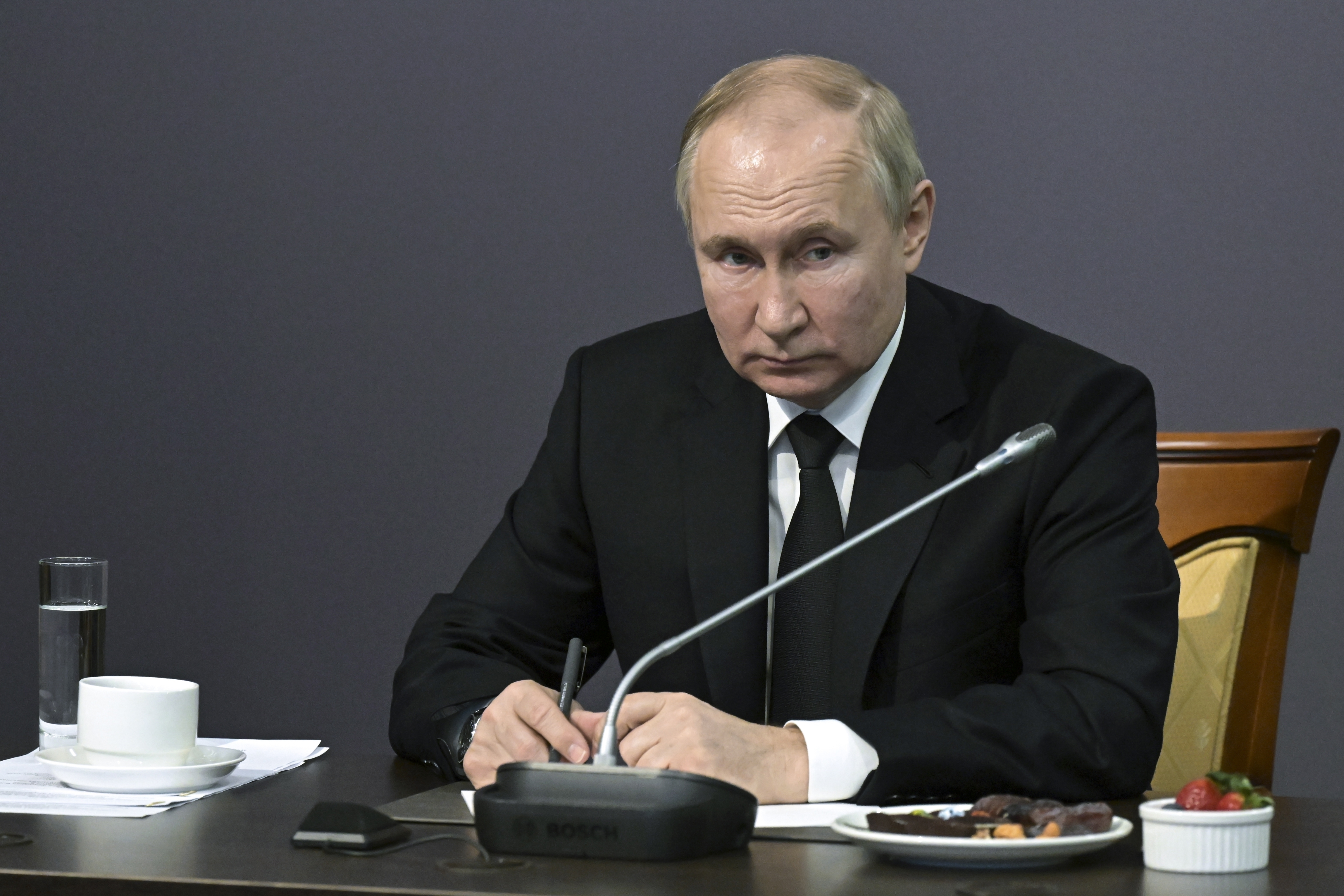 Russian President Vladimir Putin speaks during his meeting with WWII veterans and representatives of patriotic civil society associations at the State Memorial Museum of the Defense and Siege of Leningrad in St. Petersburg, Russia, Wednesday, Jan. 18, 2023