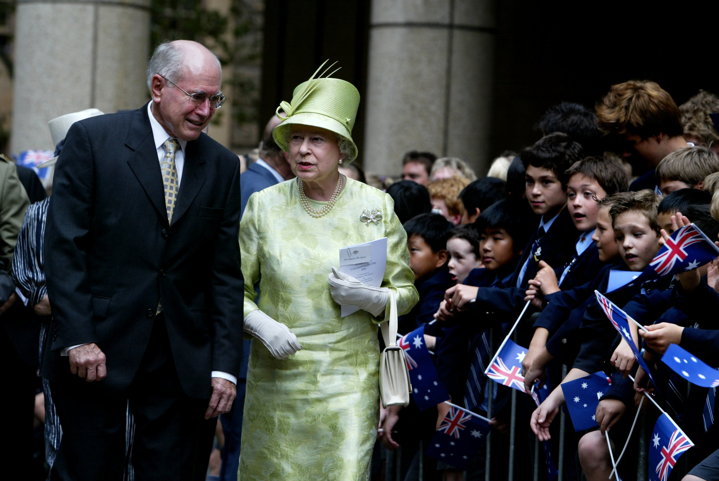 The Queen greets students from St Andrews School on her one day Sydney visit.