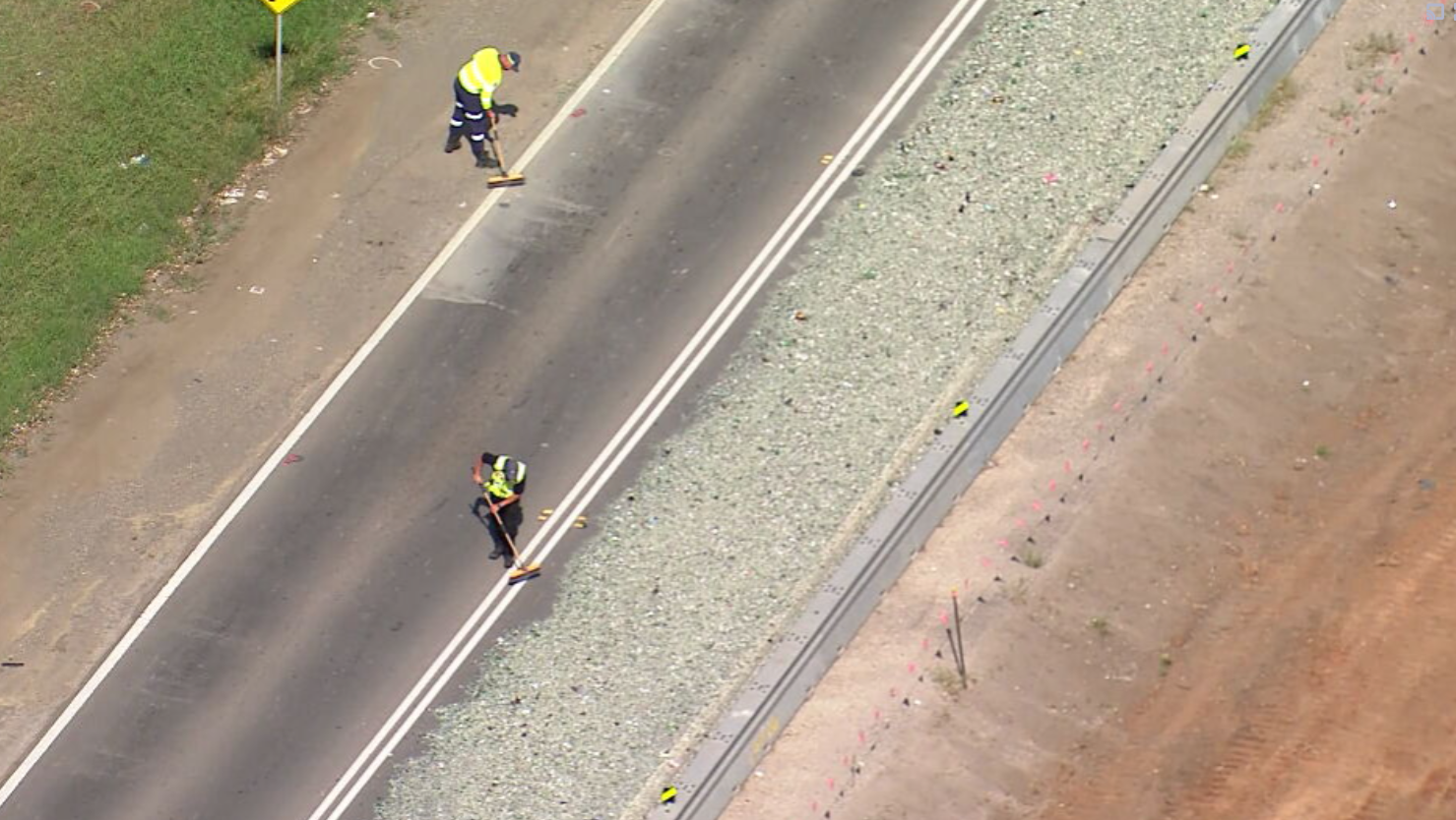 Three tonnes of crushed glass strewn across Sydney street