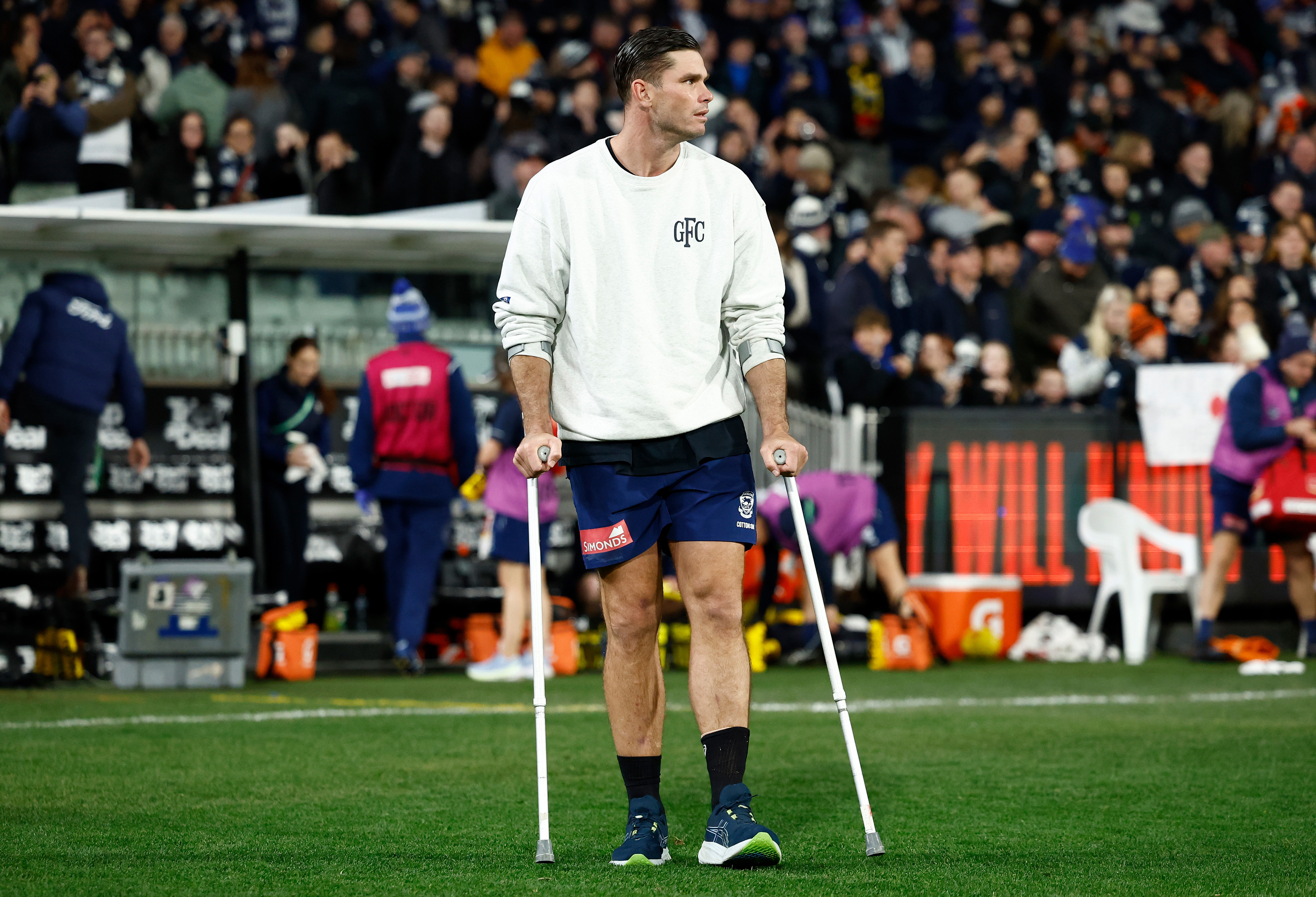 Tom Hawkins was on crutches at the end of the Geelong match against Carlton.