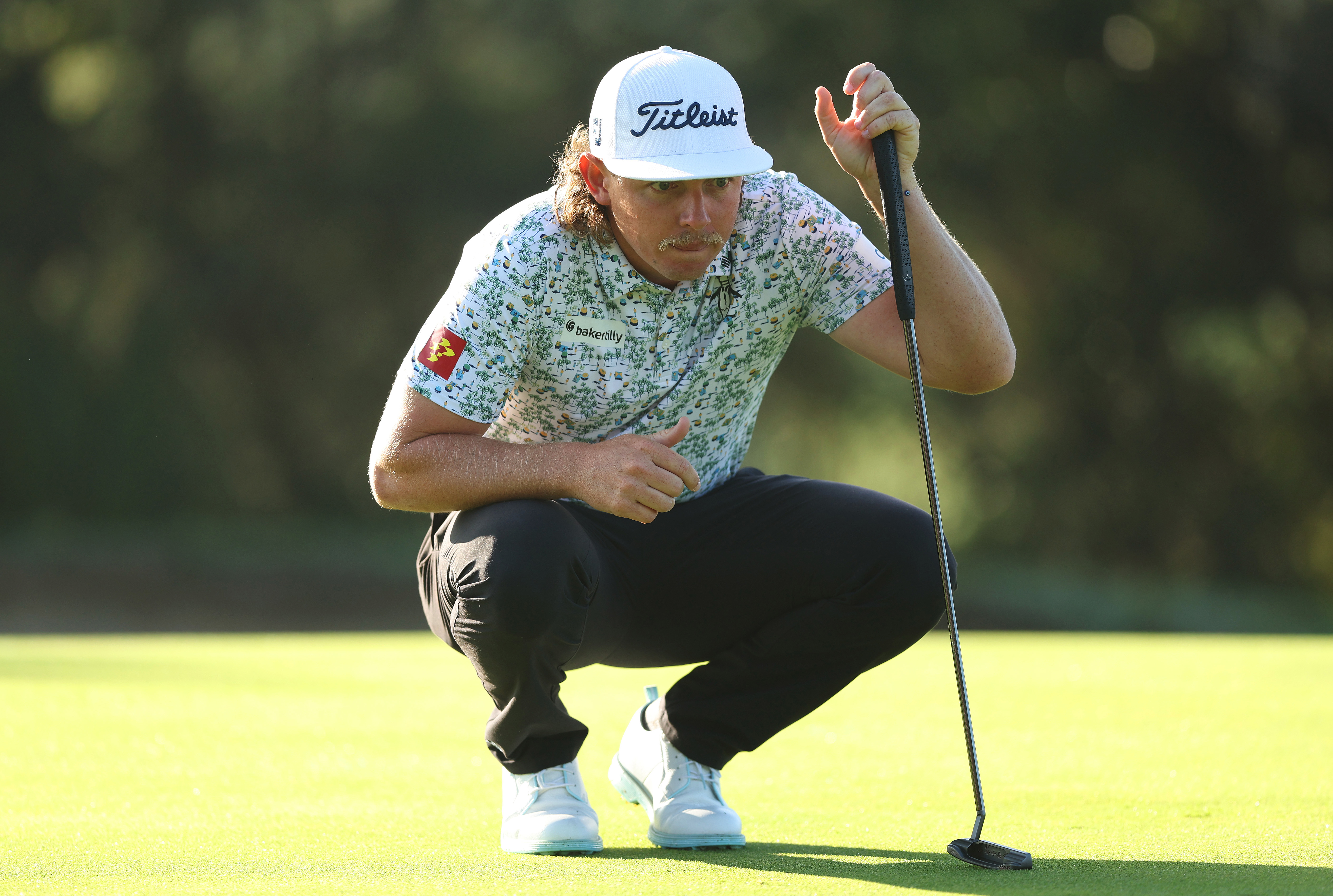 Cameron Smith of Australia lines up a putt.