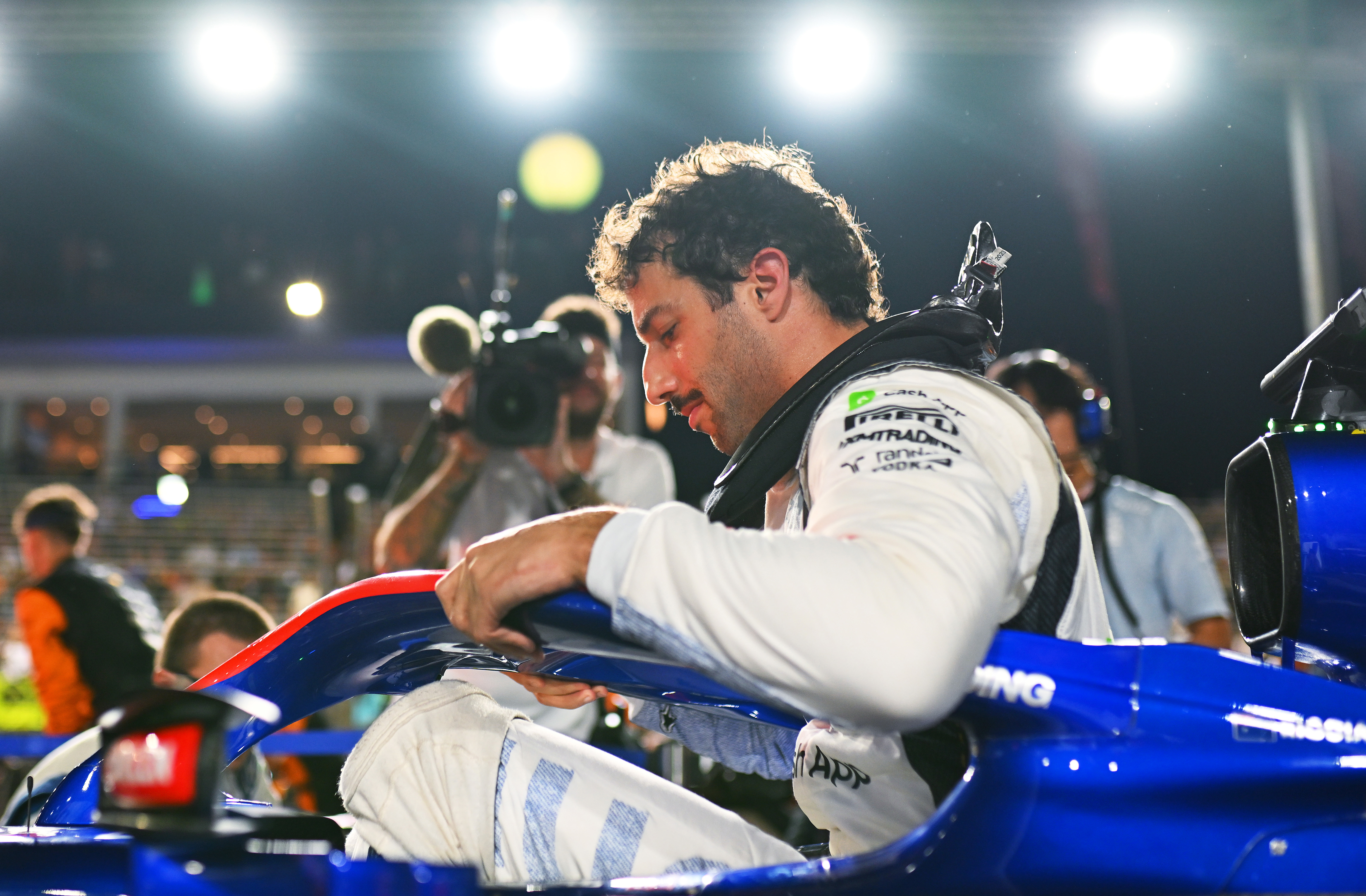 Daniel Ricciardo of Australia and Visa Cash App RB on the grid prior to the F1 Grand Prix of Singapore at Marina Bay Street Circuit on September 22, 2024 in Singapore, Singapore. (Photo by Rudy Carezzevoli/Getty Images)